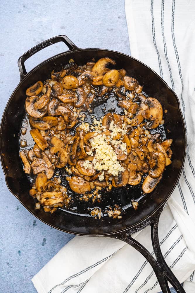 cooked mushrooms with minced garlic