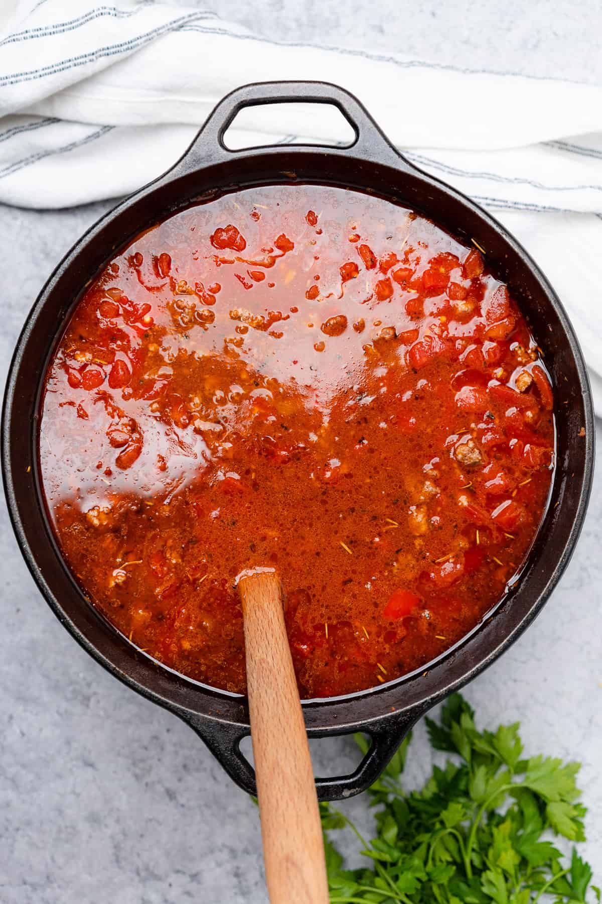 bright red base of keto cabbage roll soup with tomatoes