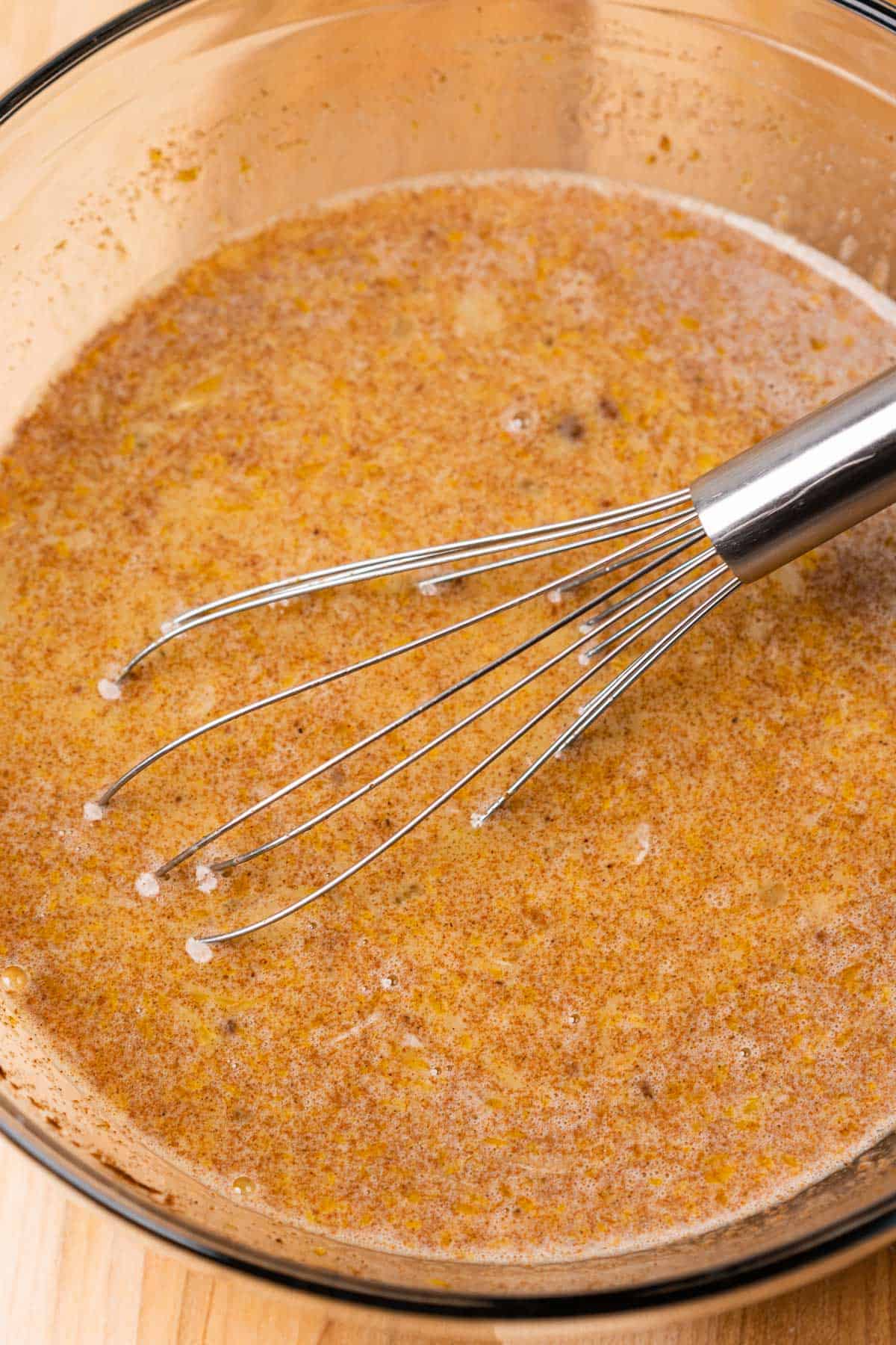 whisk in a bowl of egg mixture for keto french toast