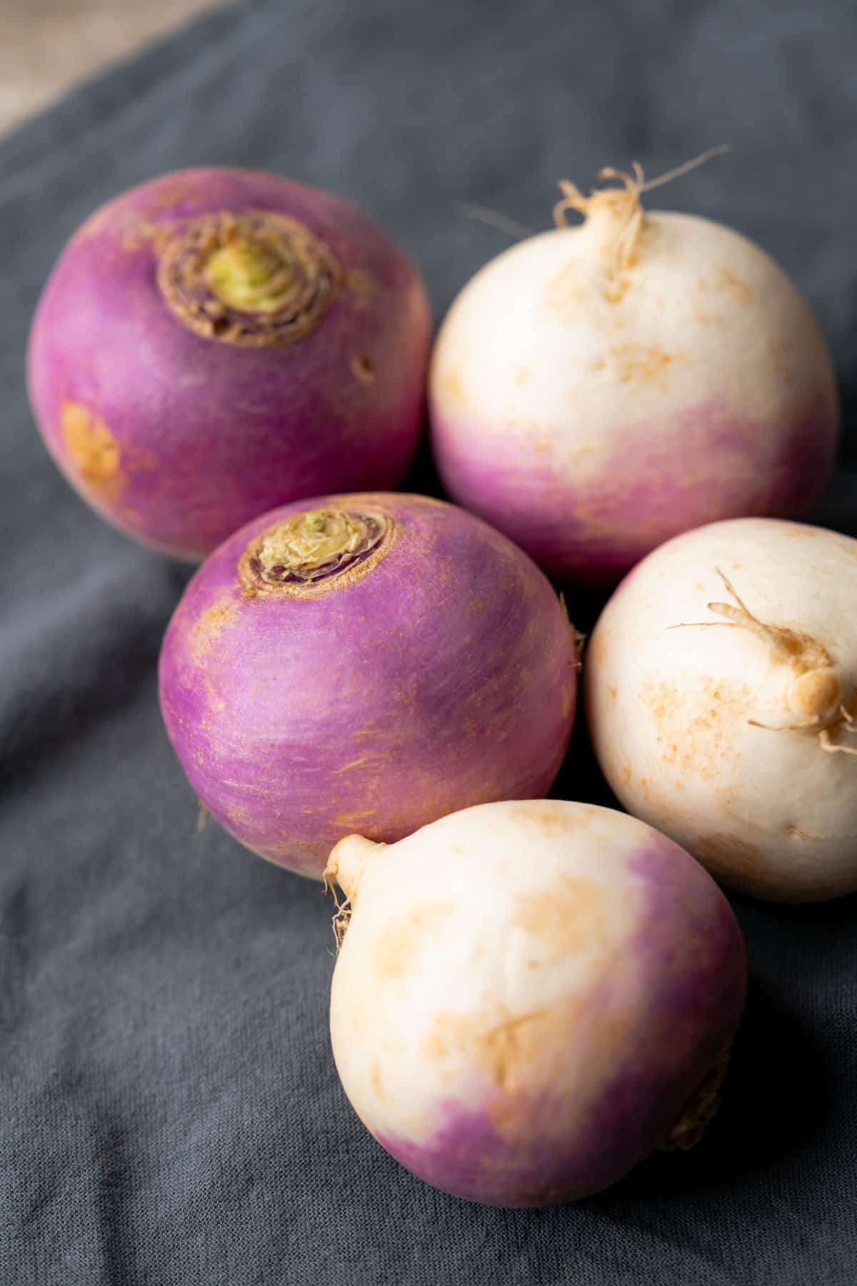 photo of fresh turnips on a blue napkin