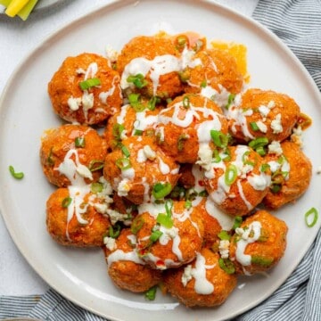 white plate of buffalo turkey meatballs