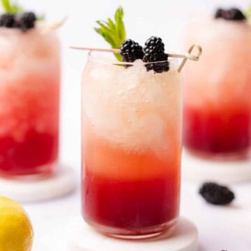 gorgeous sugar free blackberry bourbon bramble with fresh berries mint and lemon