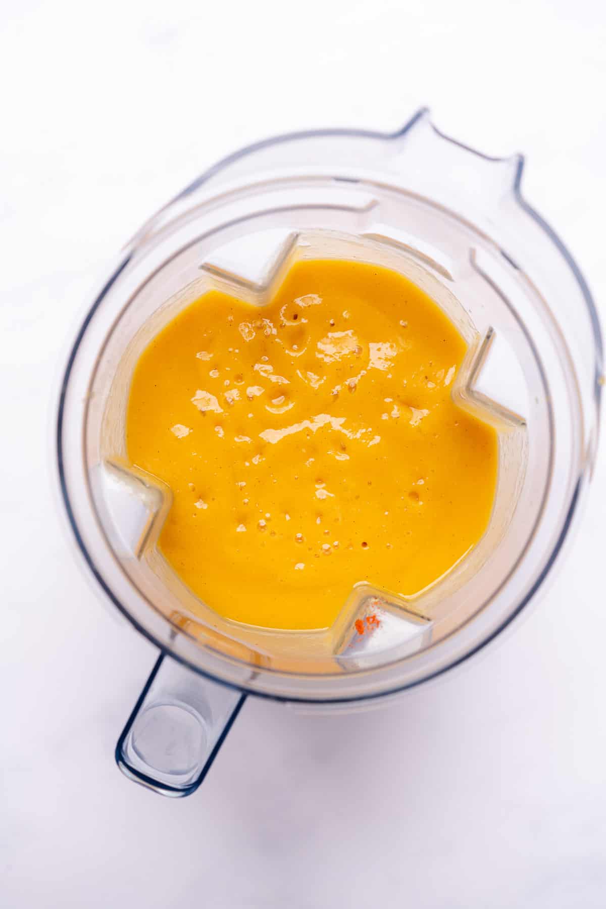 pureed mango habanero sauce in a blender