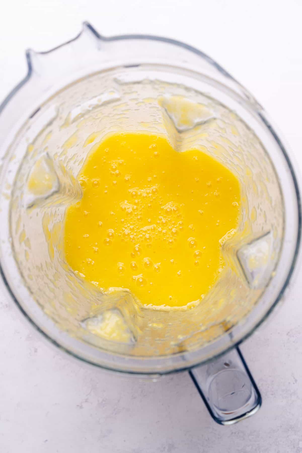 blended mango and lime juice in a blender