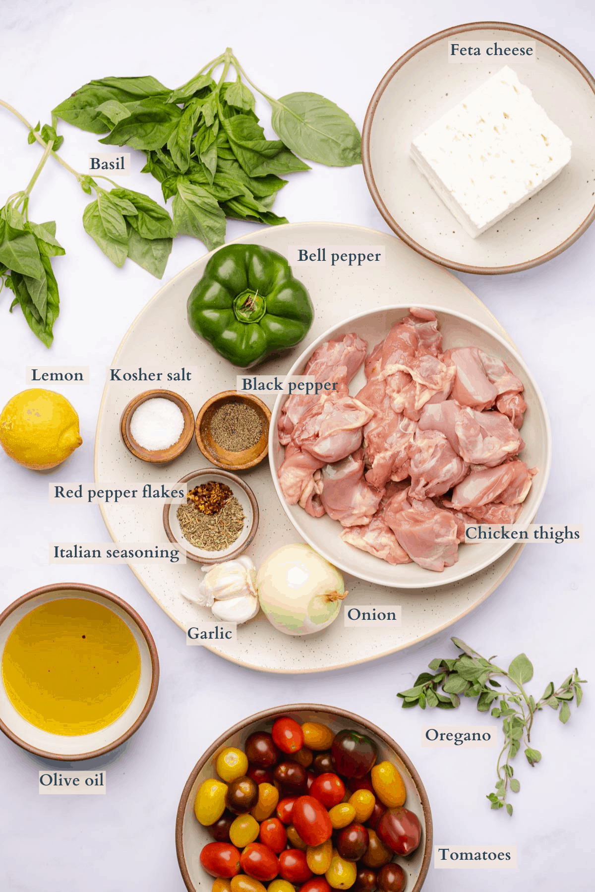 ingredients with baked chicken feta sheet pan dinner with text to denote different ingredients