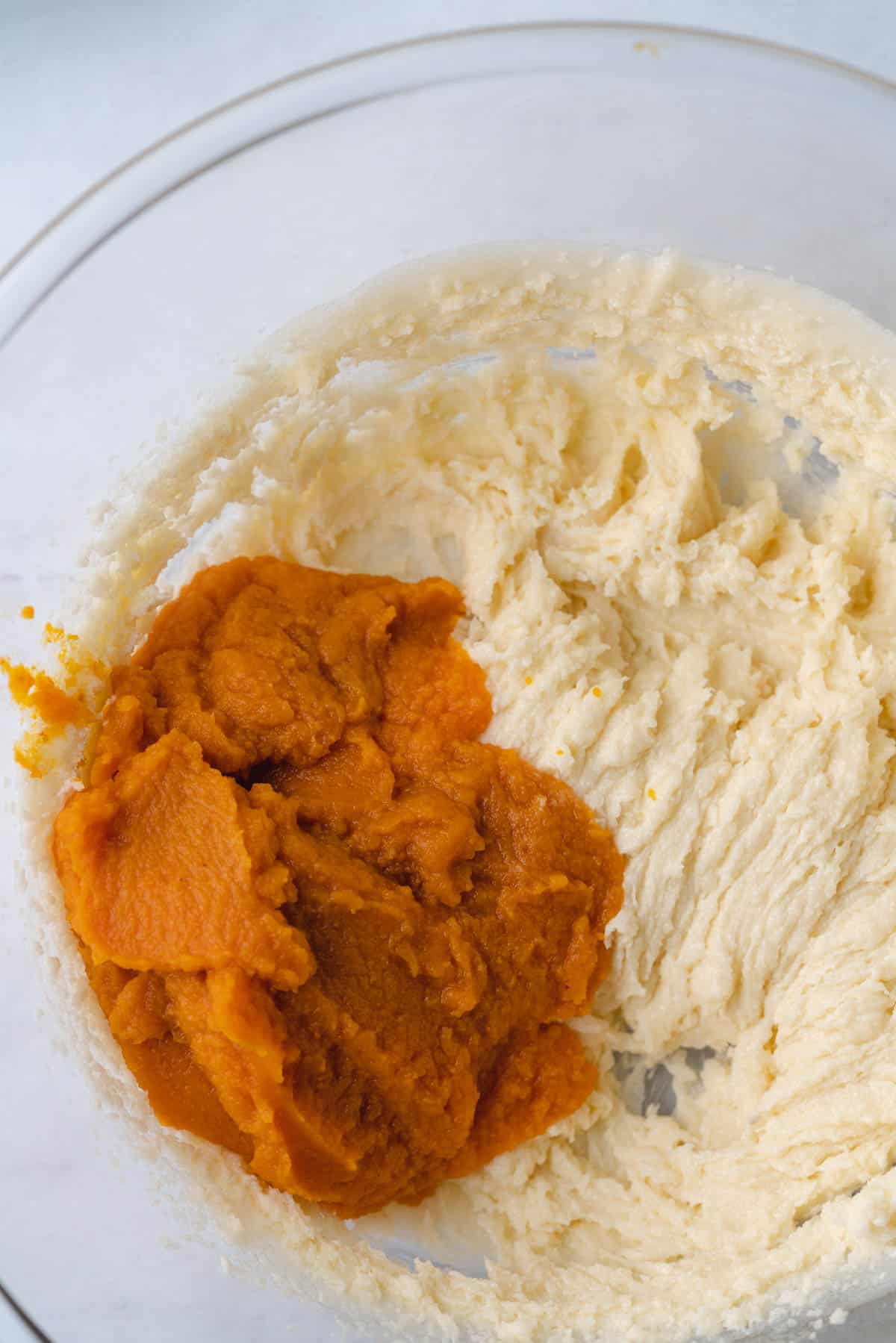 creamed butter and sweetener with pumpkin puree