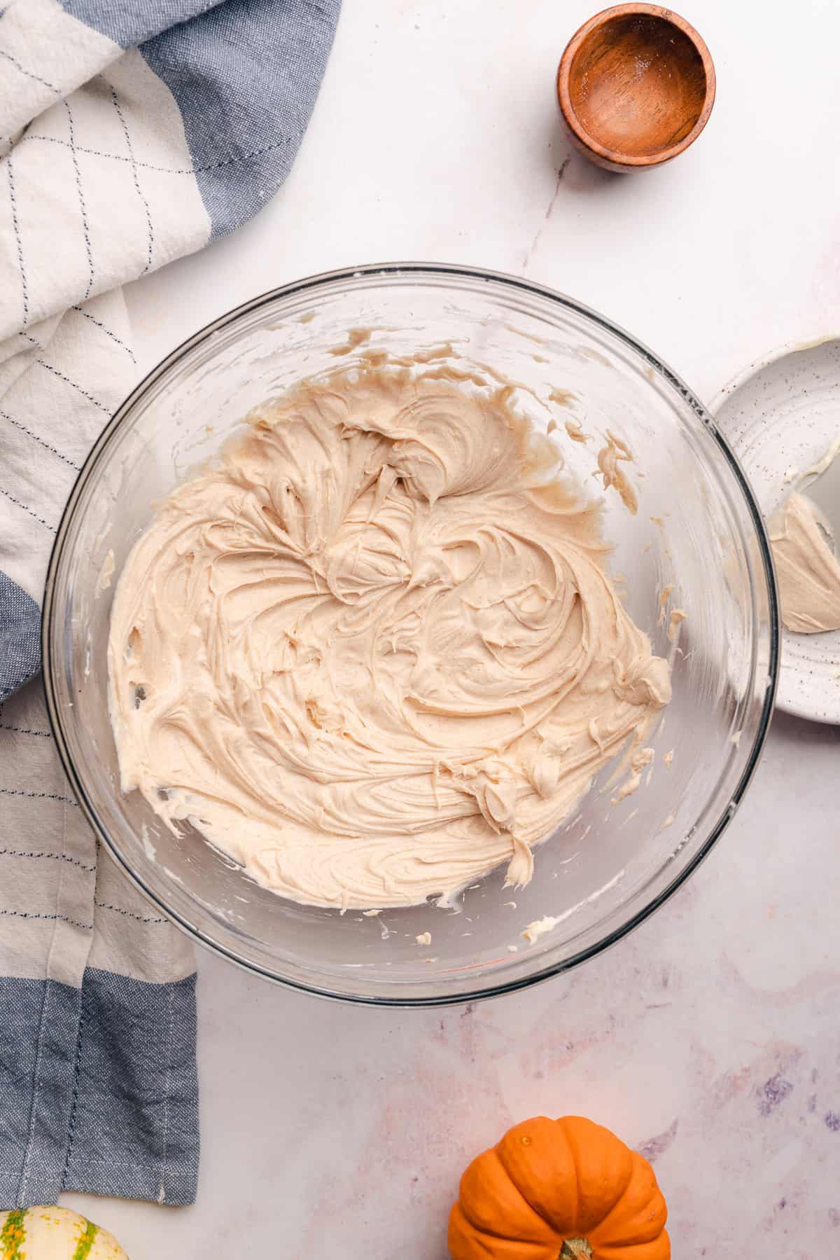 whipped cream cheese frosting in a large bowl