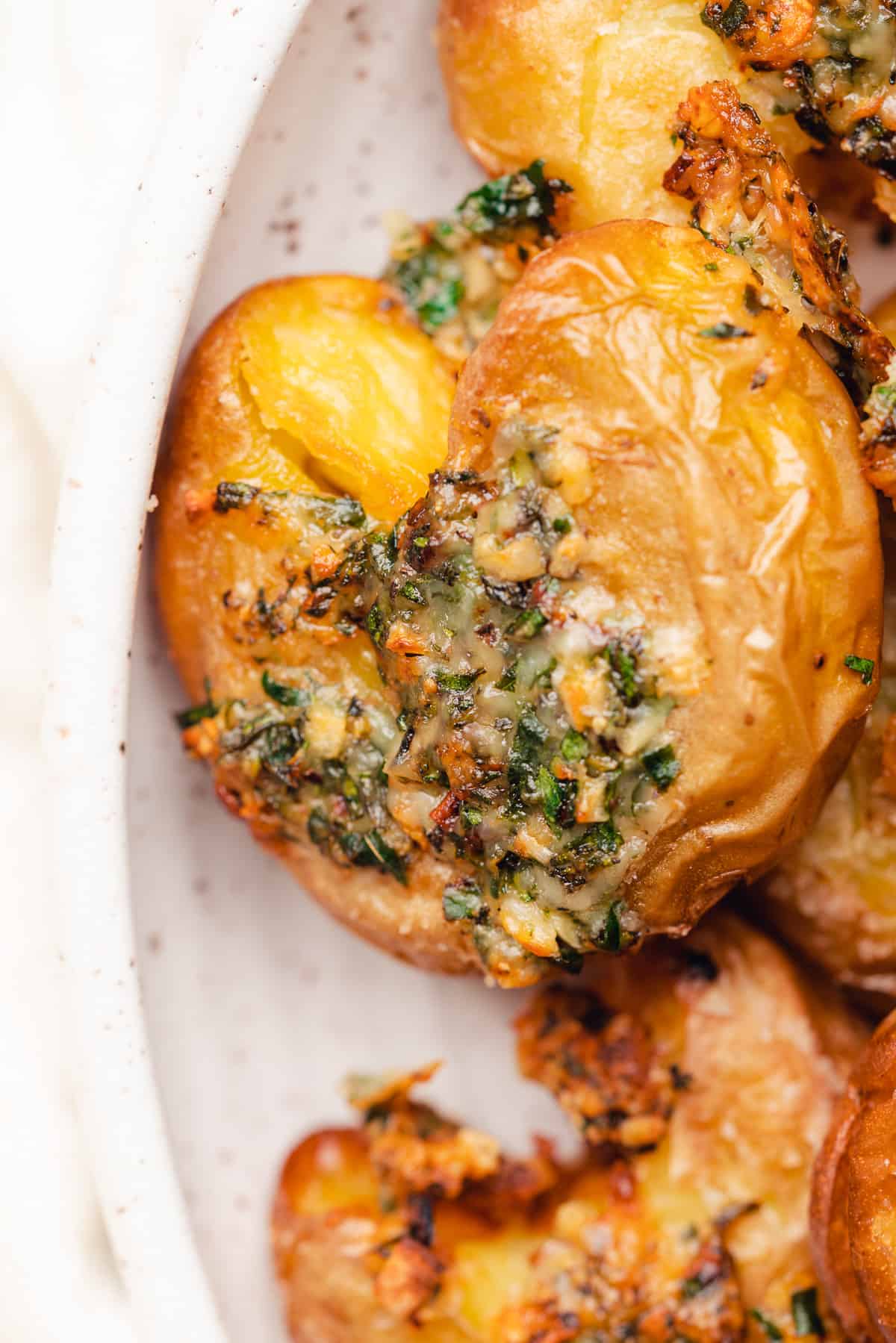 close up shot of crispy air fryer smashed potatoes