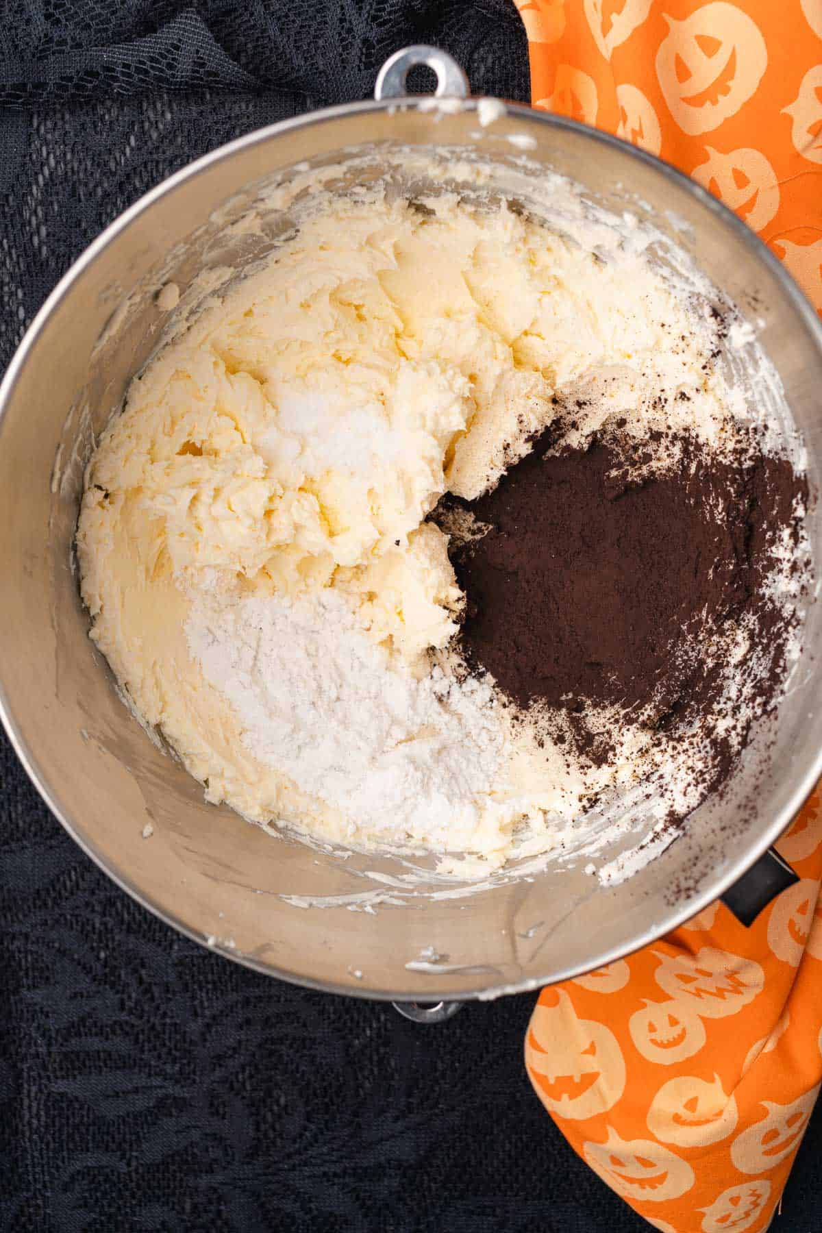 creamed butter, cream cheese, and black cocoa powder, powdered sweetener and kosher salt in a bowl