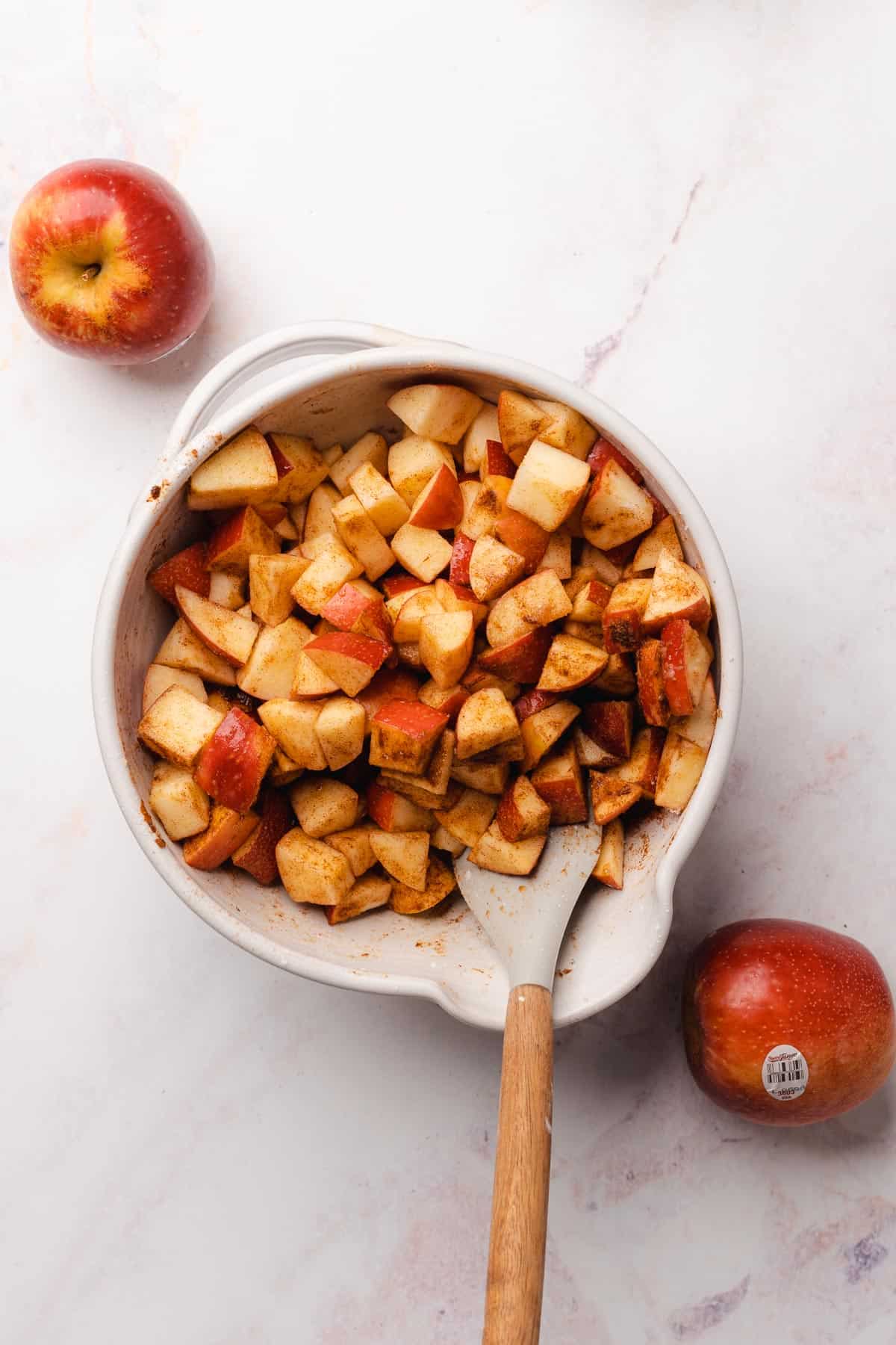 apples mixed together in a bowl