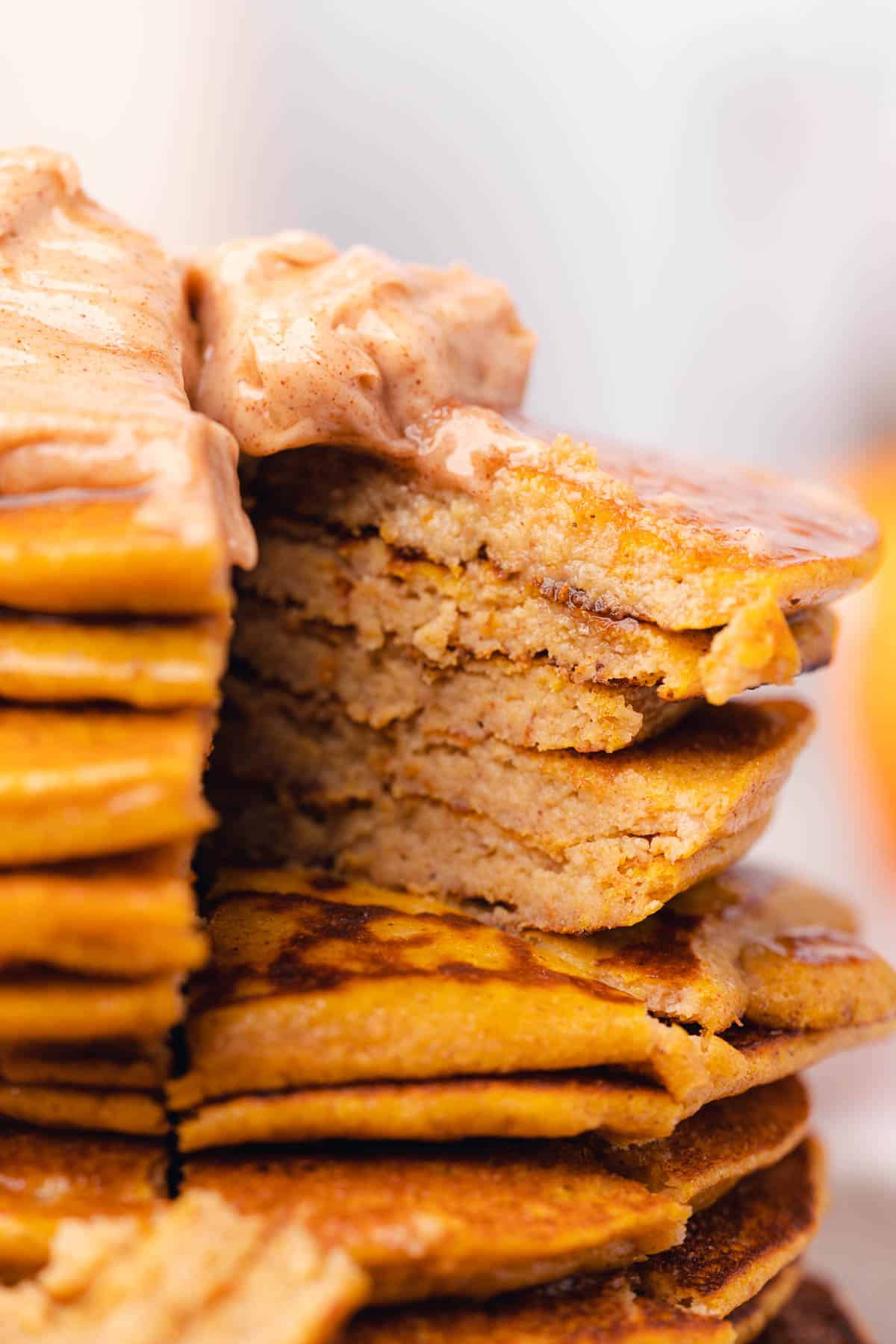 close up shot of a stack of keto pumpkin pancakes