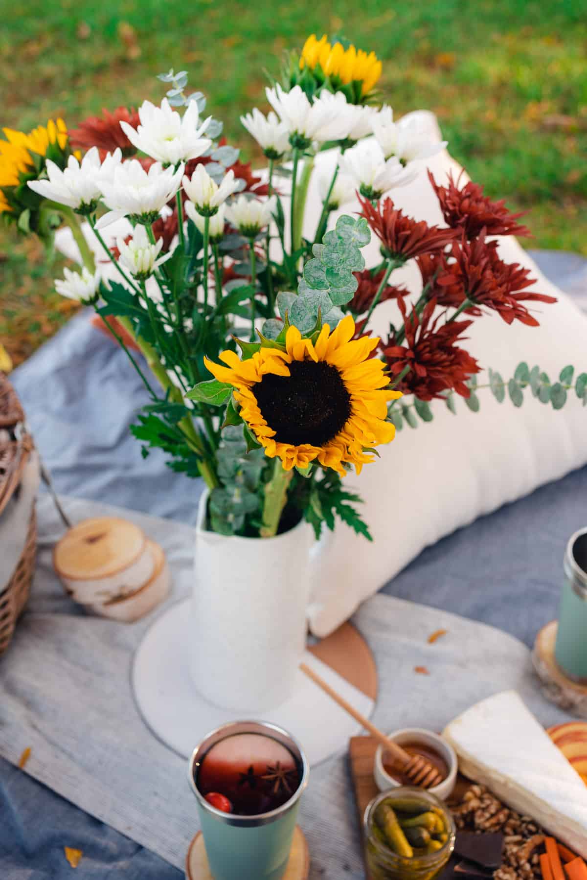 beautiful flowers and a small charcuterie board, and mulled wine