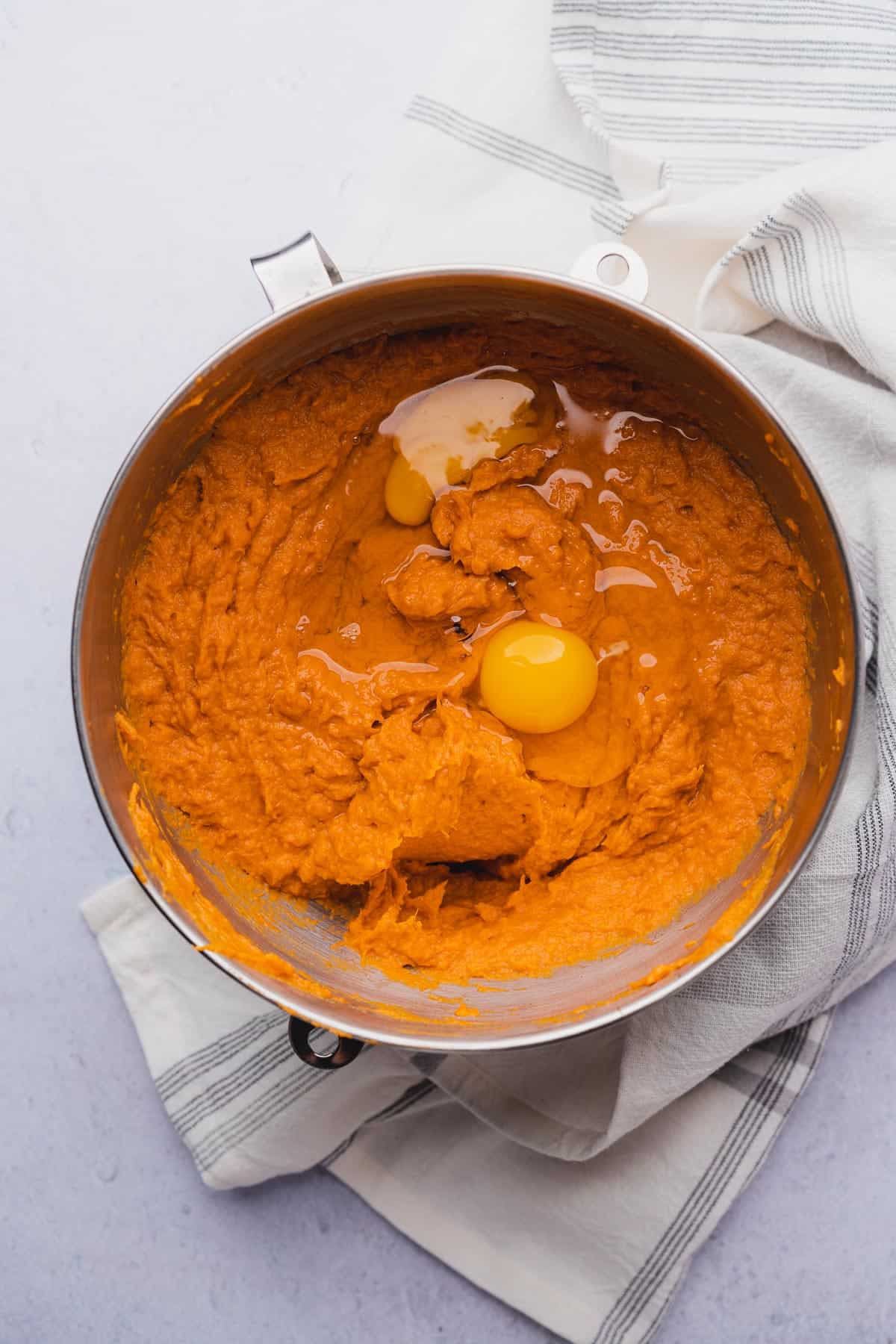 mashed sweet potato mixture with raw eggs inside