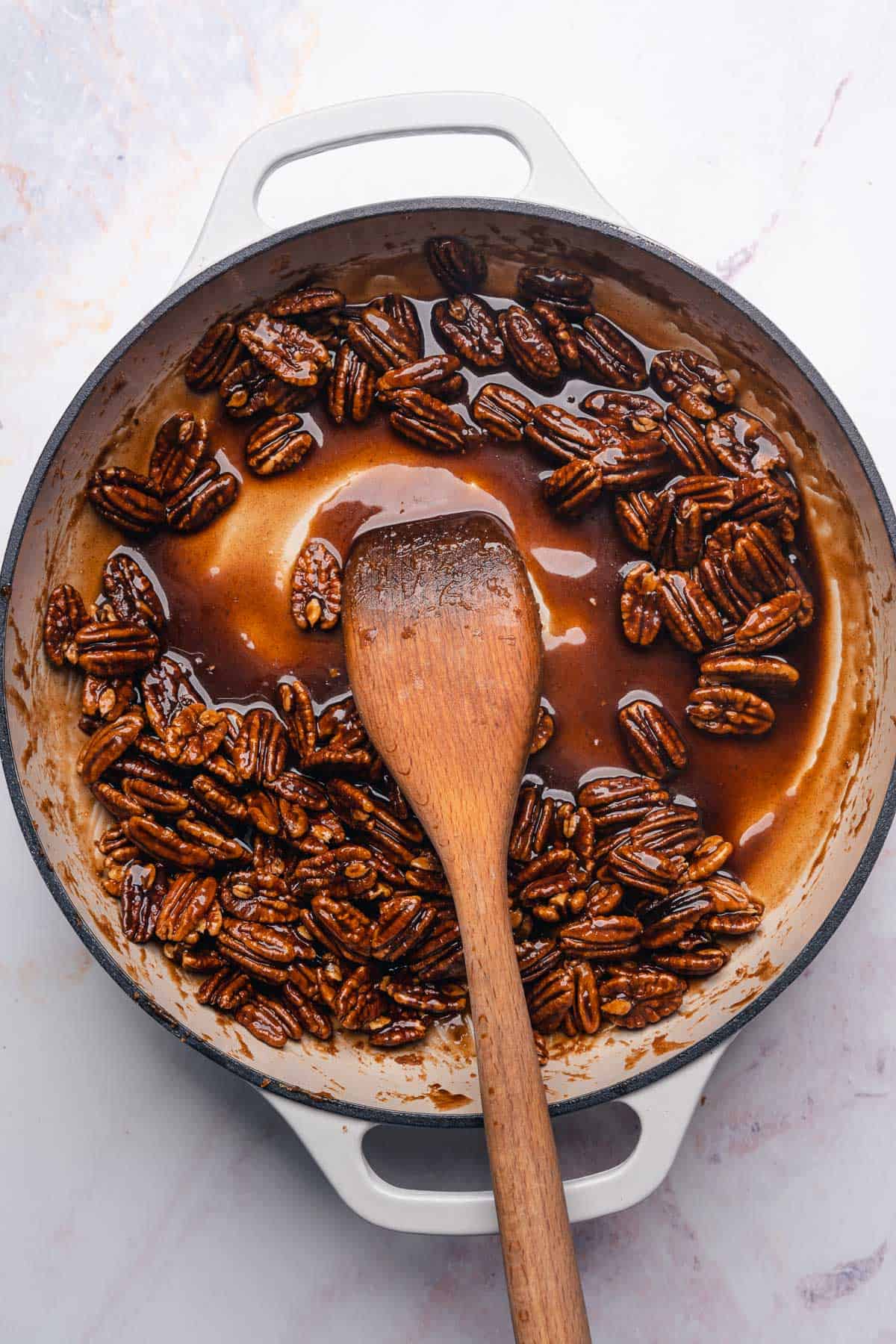 sweet buttery sauce and pecans in an enameled cast iron