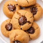 gluten free peanut butter blossoms with a melty chocolate center and sea salt