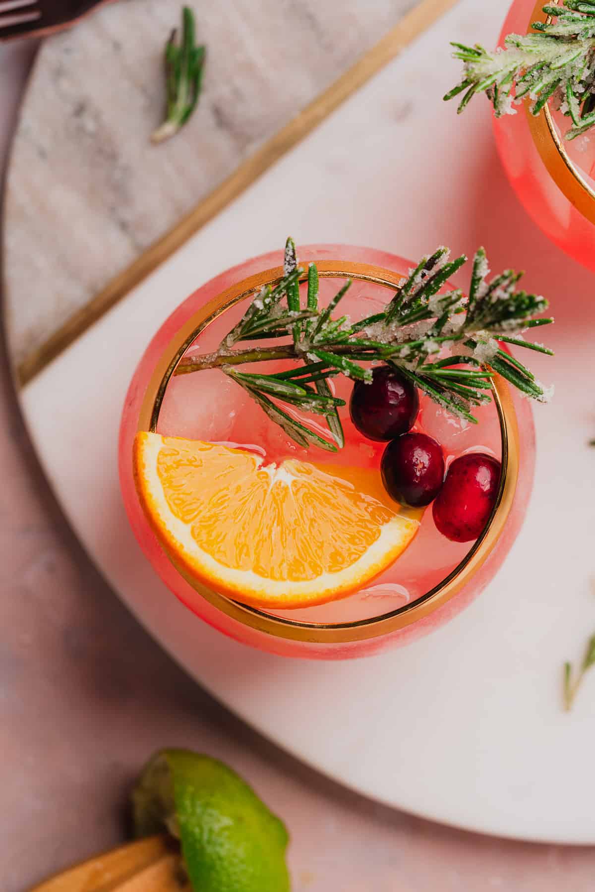 flat lay shot of a cranberry prosecco margarita 