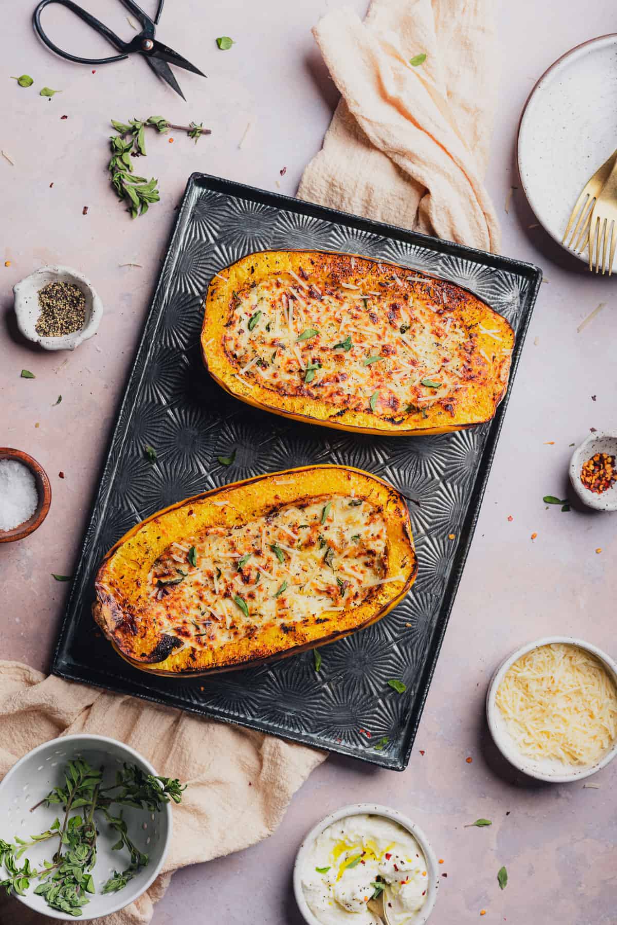 two loved air fryer spaghetti  squash halves baked with cheese