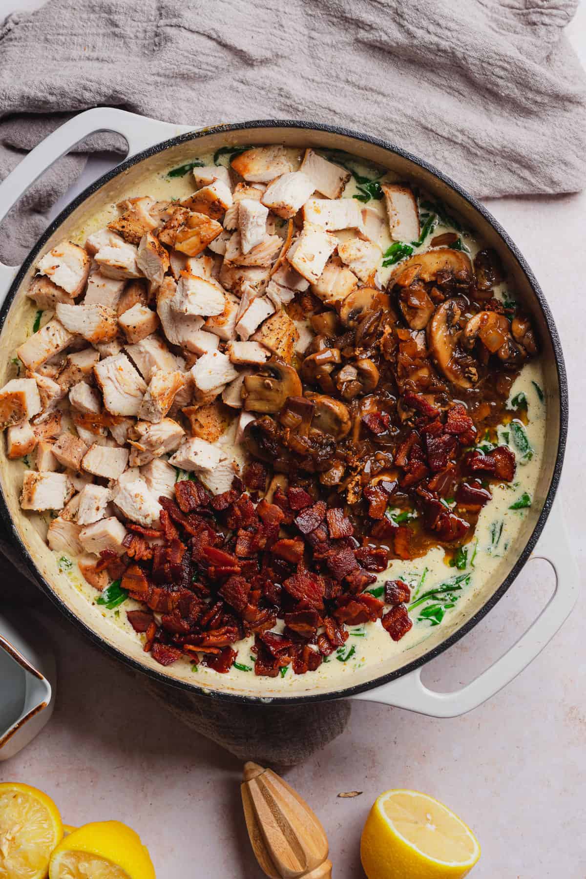 creamy sauce with chicken, bacon, spinach, and mushrooms