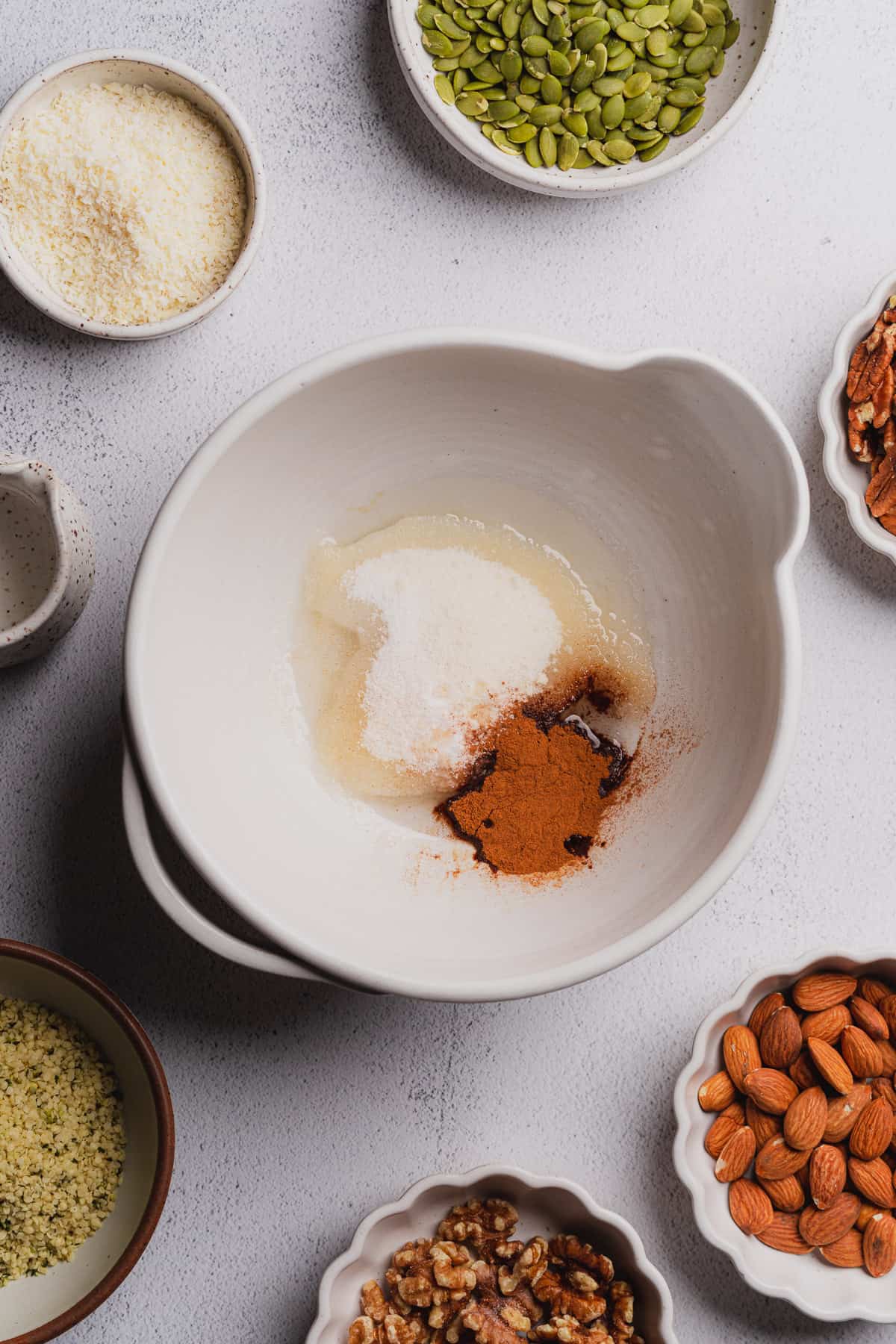 coconut oil, sweetener, salt and cinnamon in a mixing bowl