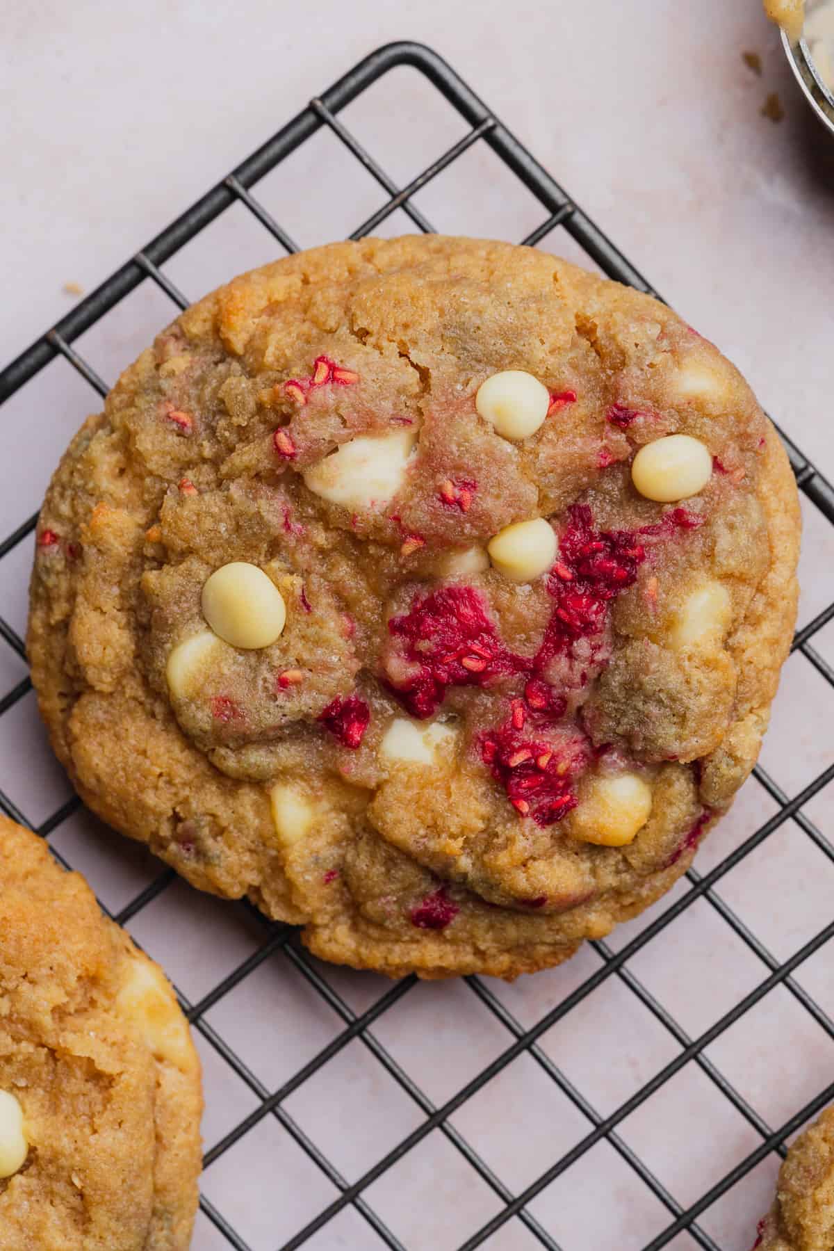 delicious close up of white chocolate raspberry cookies with fresh raspberries