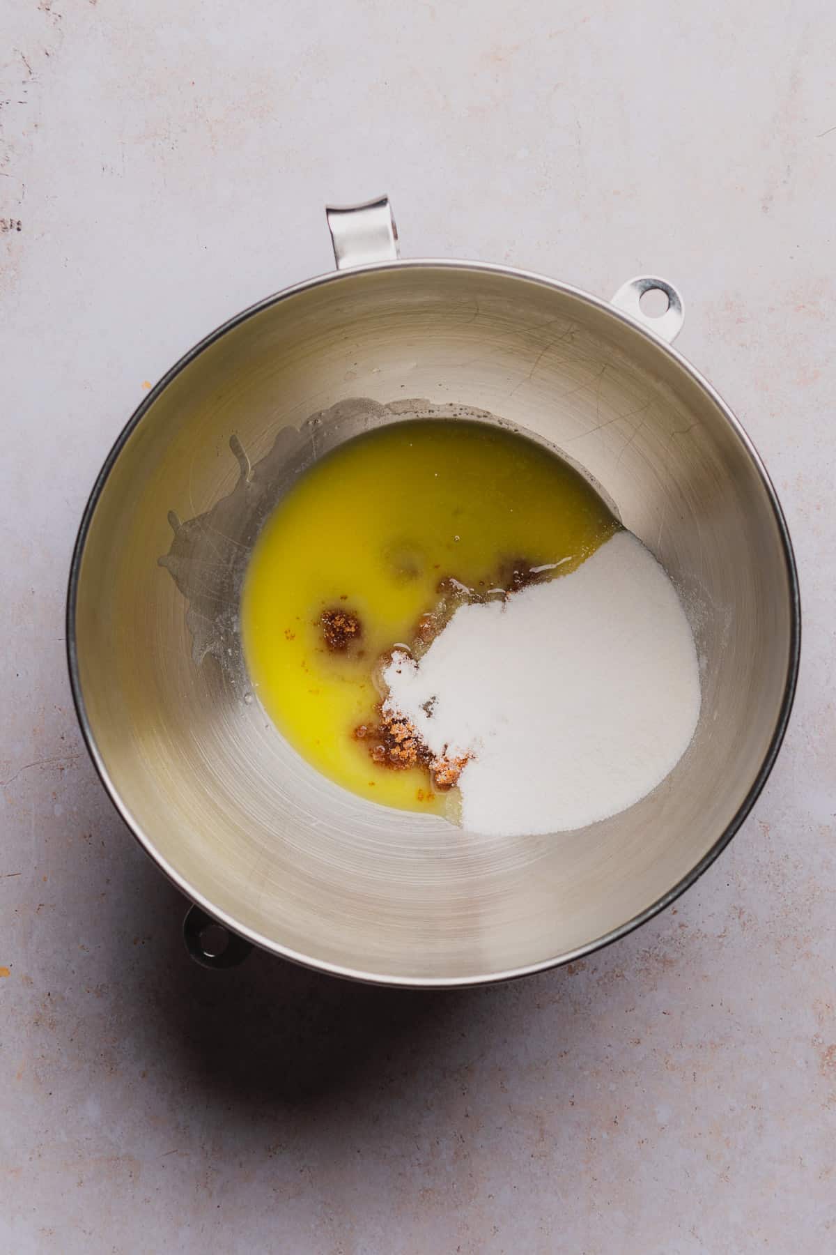 butter and sweeteners in a kitchen aid bowl 