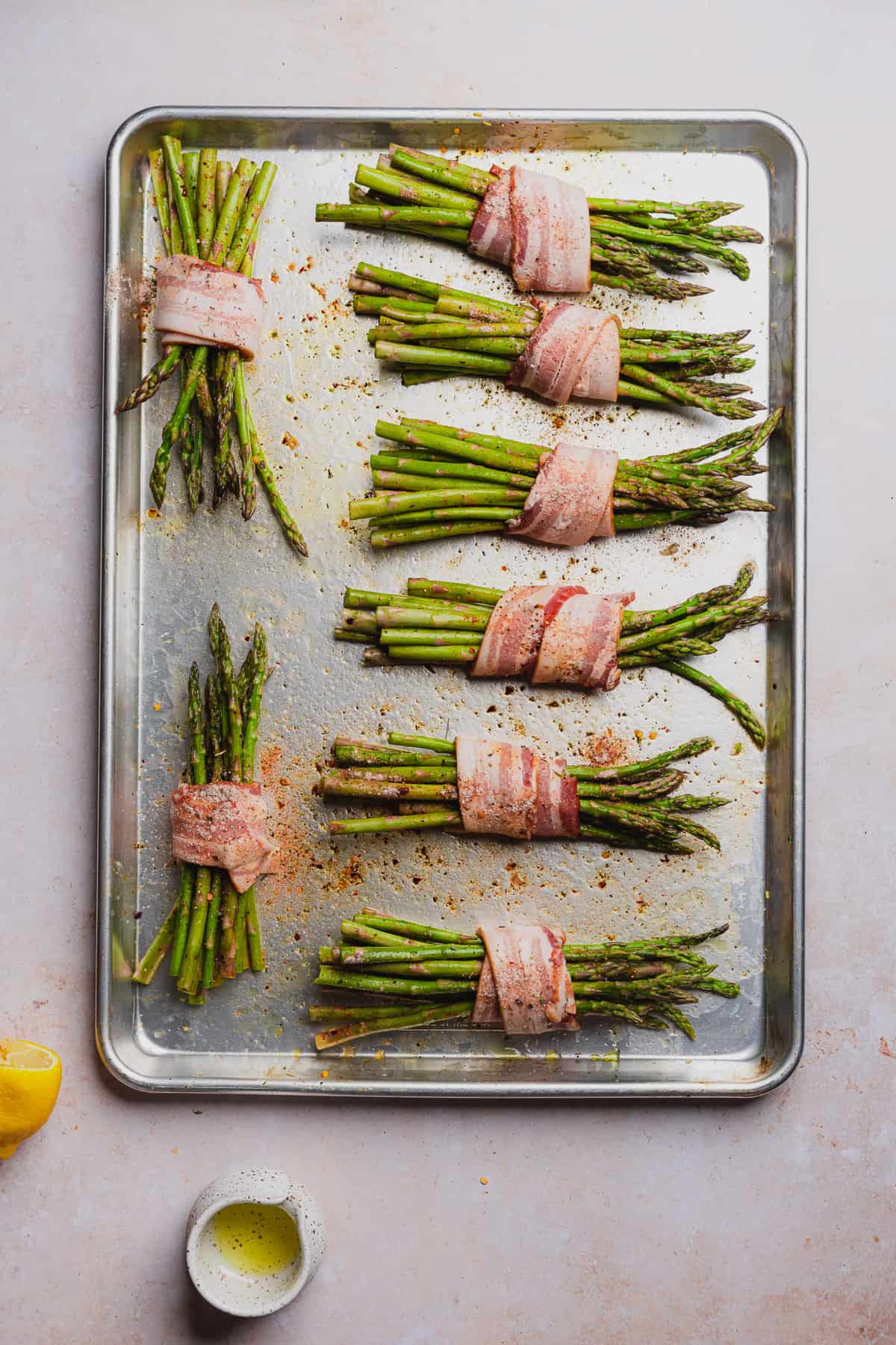 8 asparagus bundles wrapped in a strip of bacon