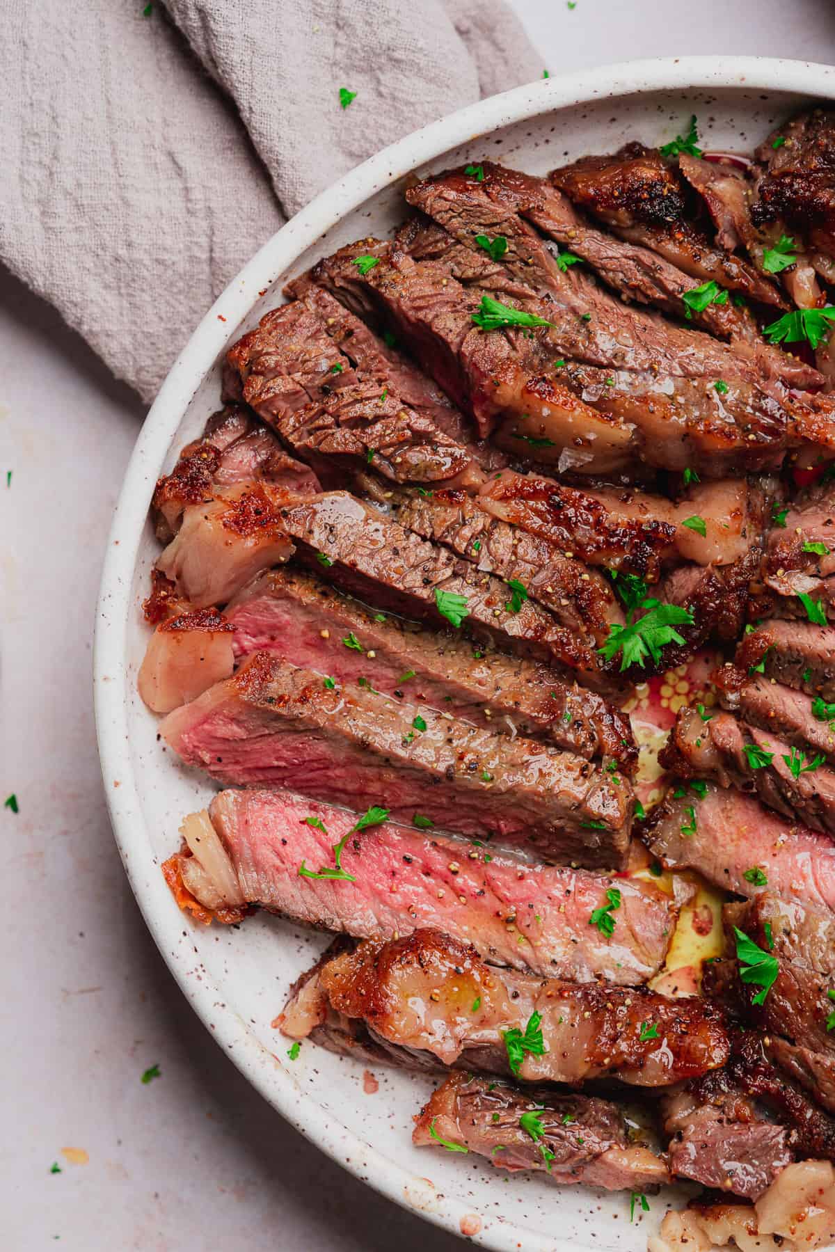 juicy medium rare air fryer ribeye steak cut into pieces
