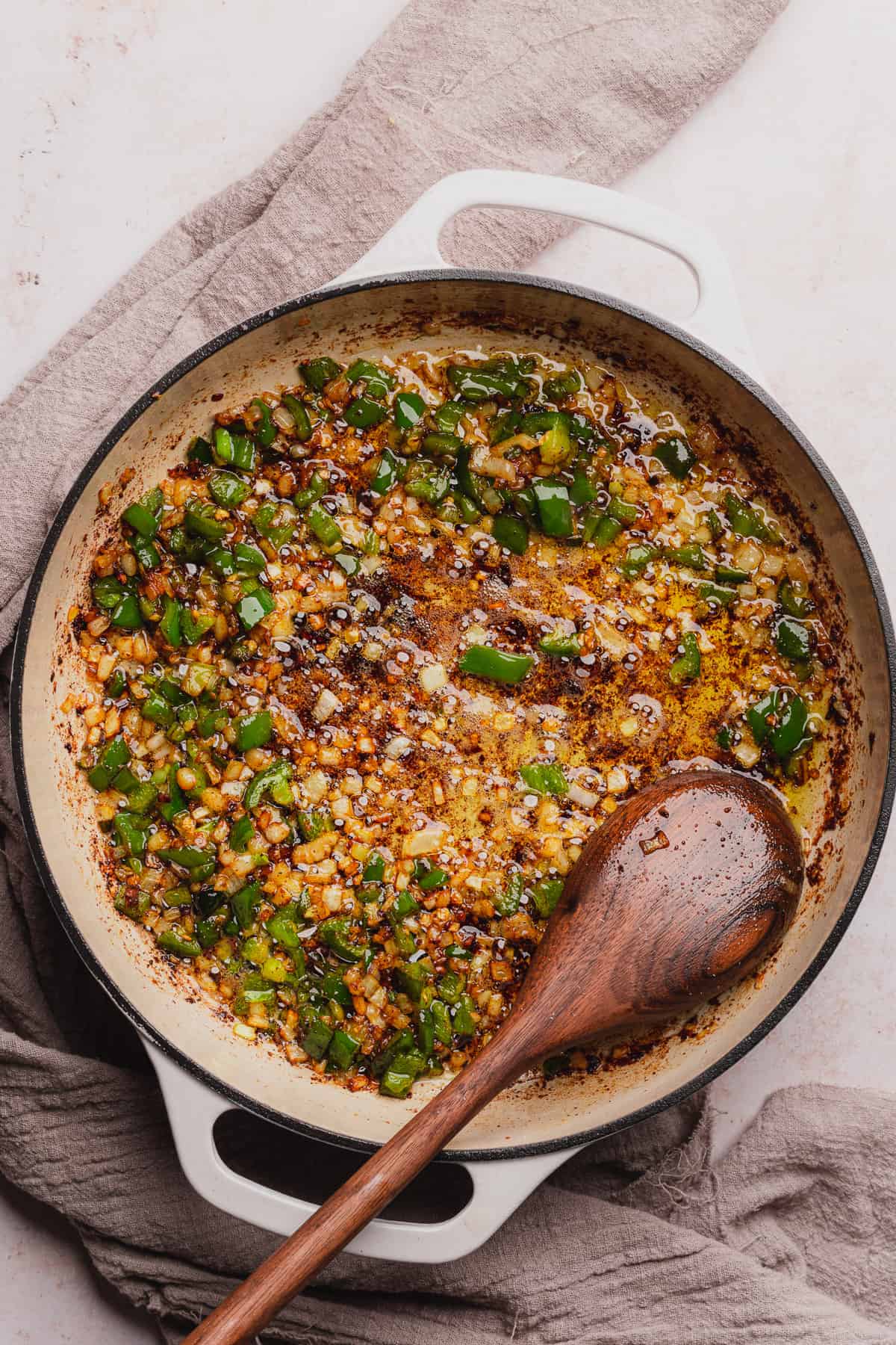 onions and jalapenos in a cast iron skillet