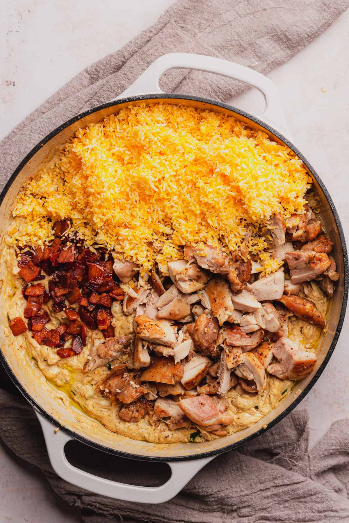 chicken, bacon, and colby jack cheese in a creamy sauce