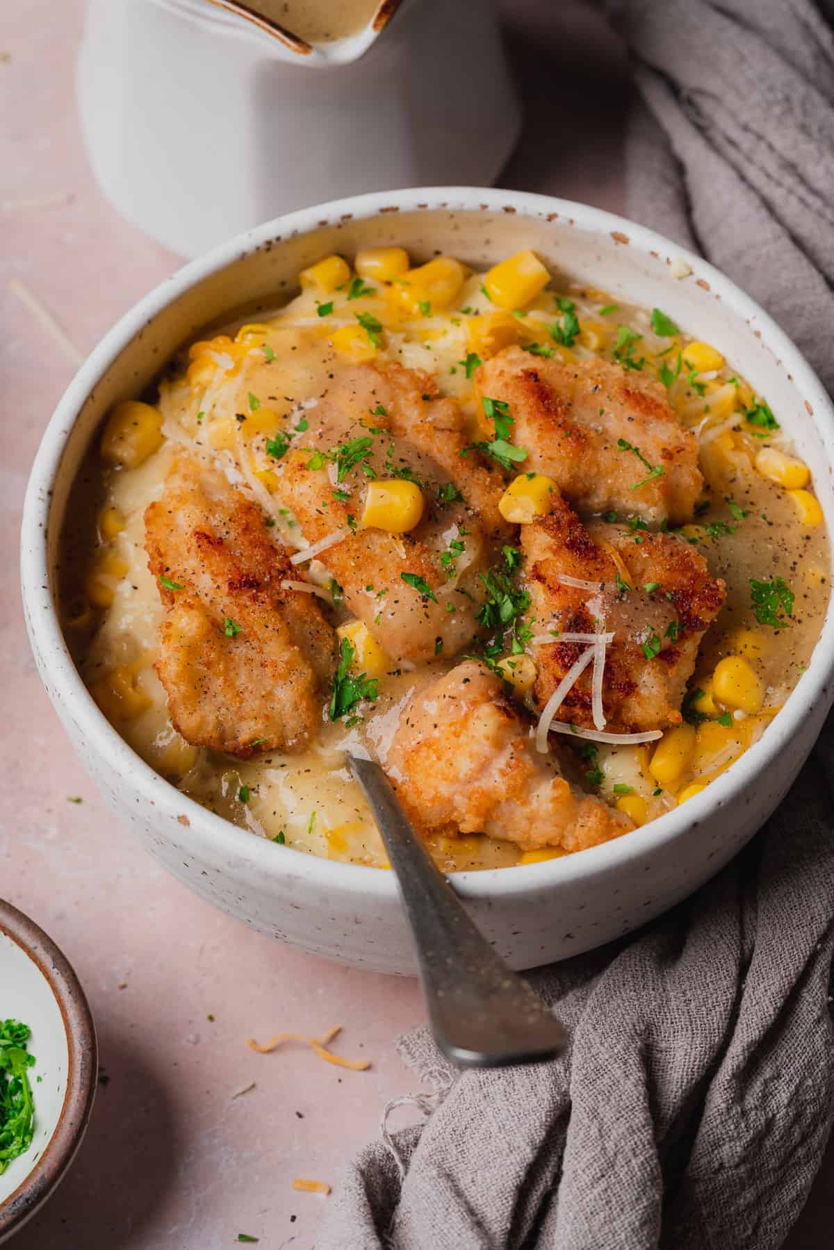 45 degree shot of a kfc famous bowl with a spoon in the bowl 