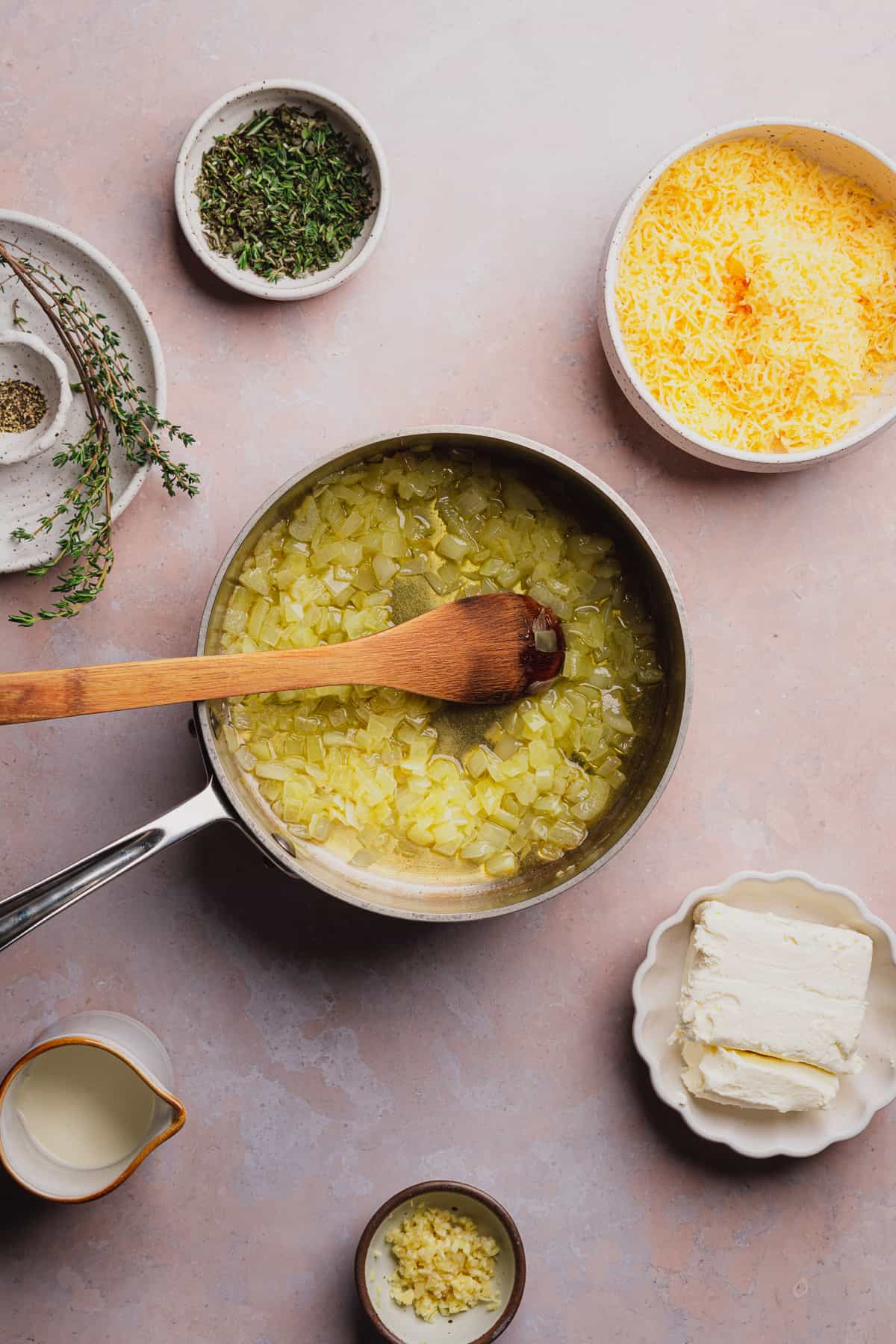 cooking onions in a pan of butter