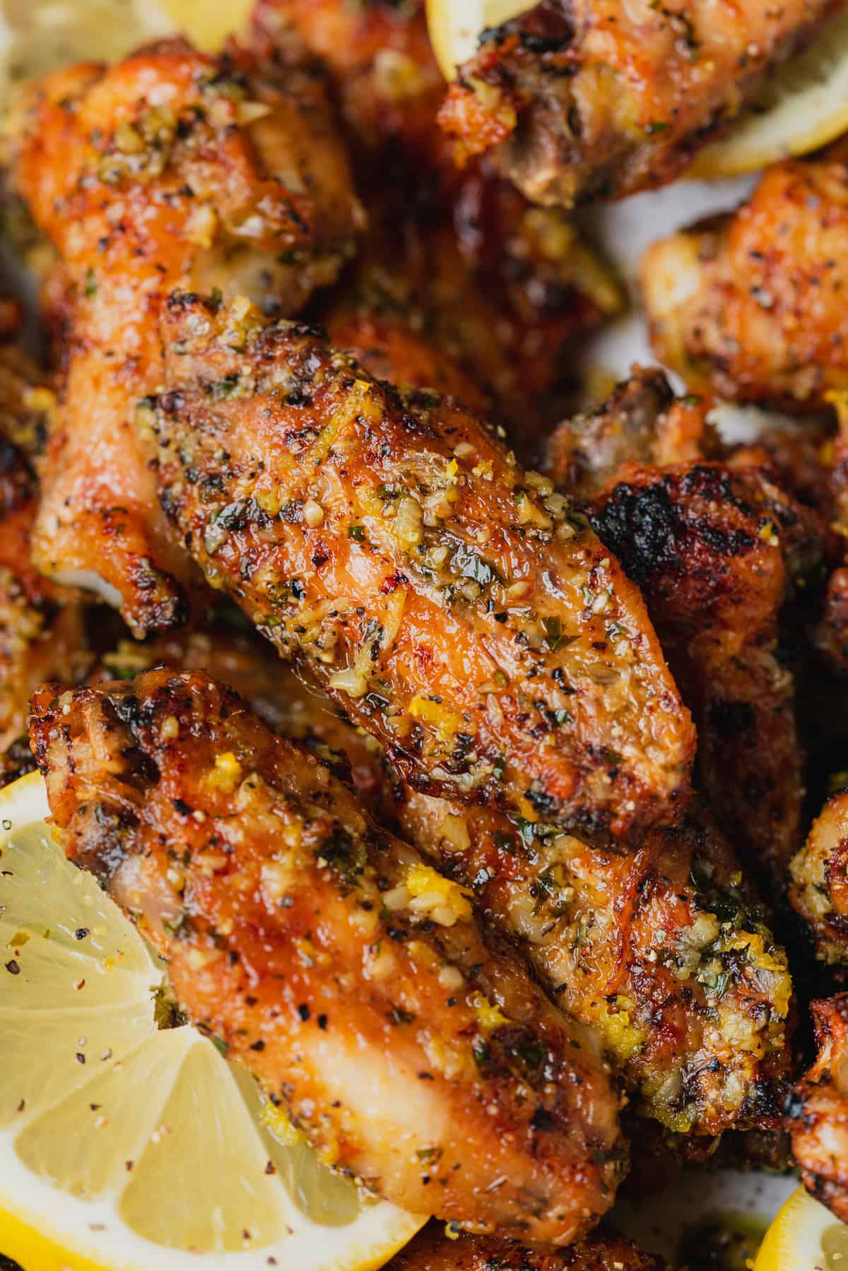 close up shot of buttery garlic lemon pepper air fryer wings.