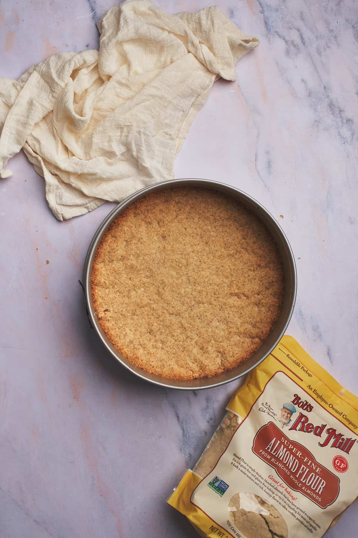 lightly baked almond flour crust in a springform pan. 