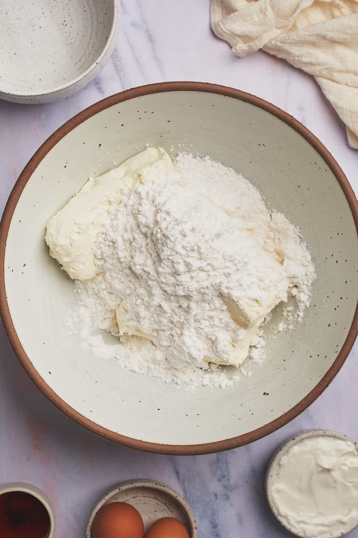 softened cream cheese and powdered sweetener in a large mixing bowl. 