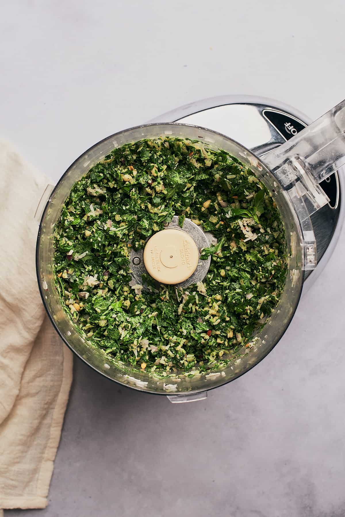 pulsed basil, parmesan, ans pine nuts in a food processor.