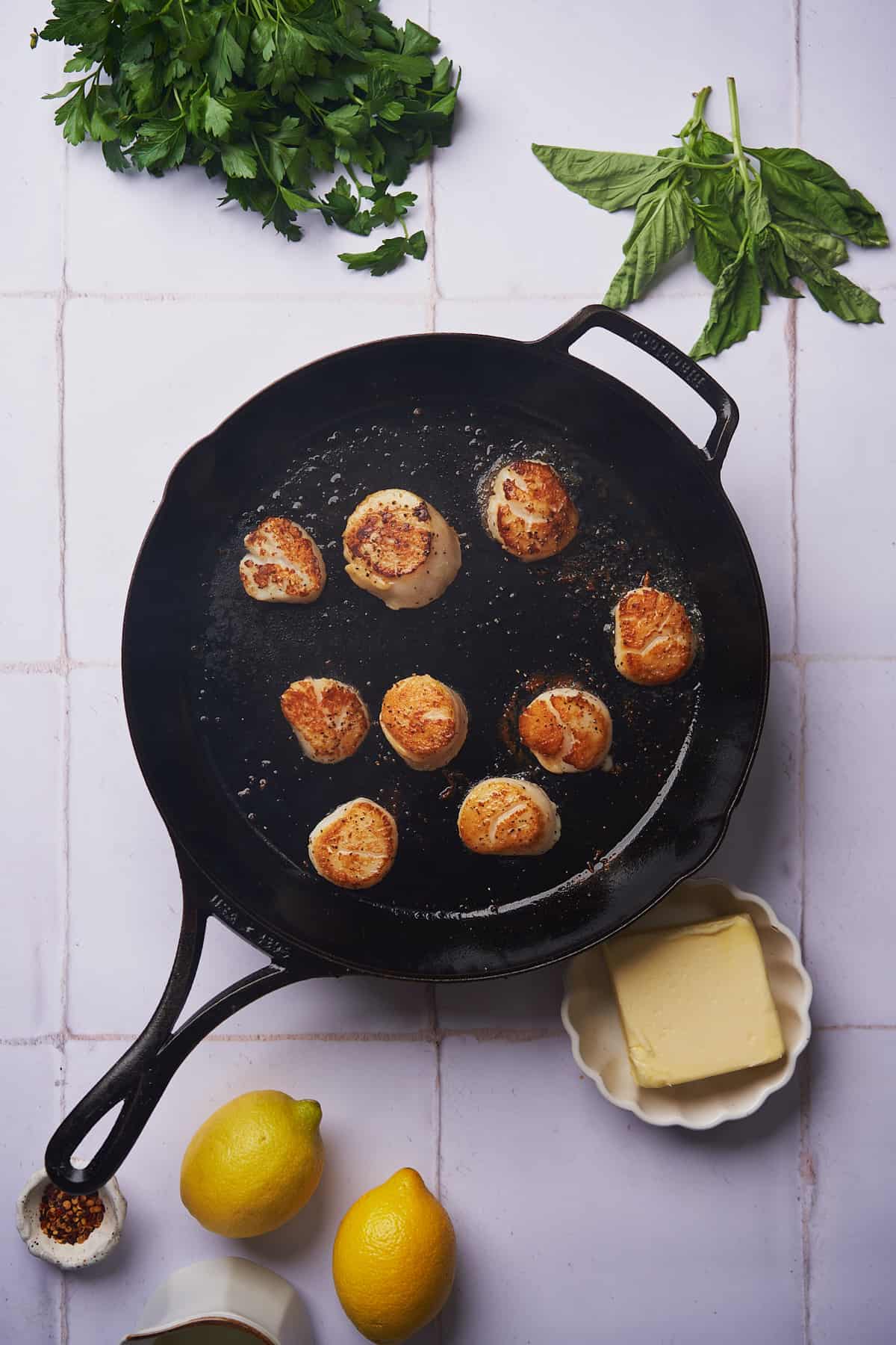 seared scallops in a cast iron skillet with a nice browned crust. 