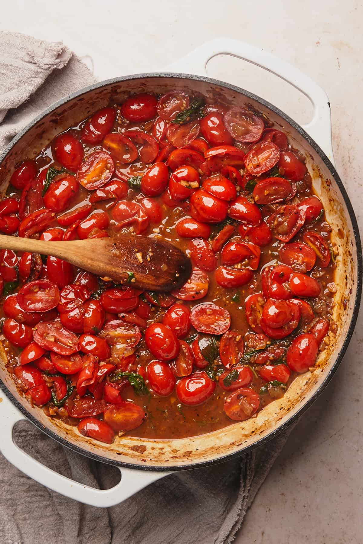 pomodoro tomato sauce in a skillet beginning to soften. 