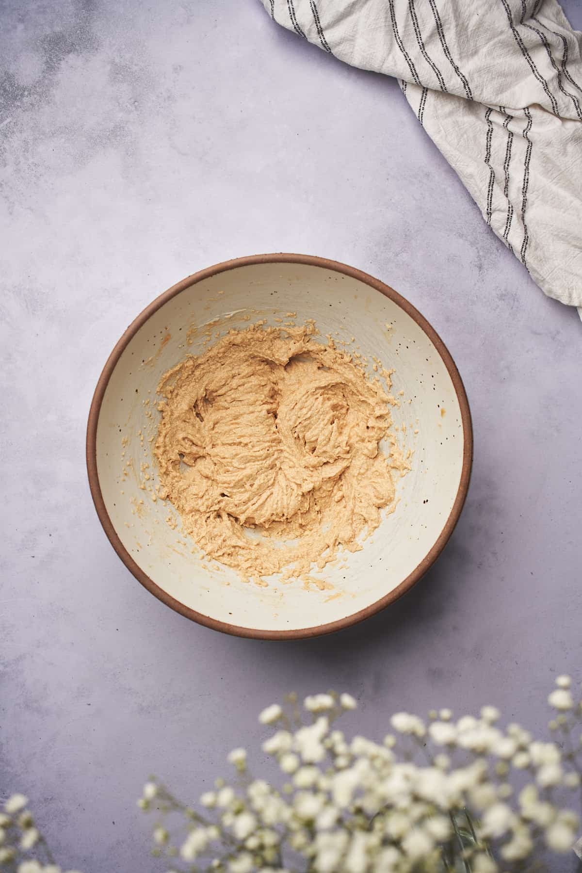 creamed low carb sweeteners, butter, and yogurt in a large mixing bowl. 