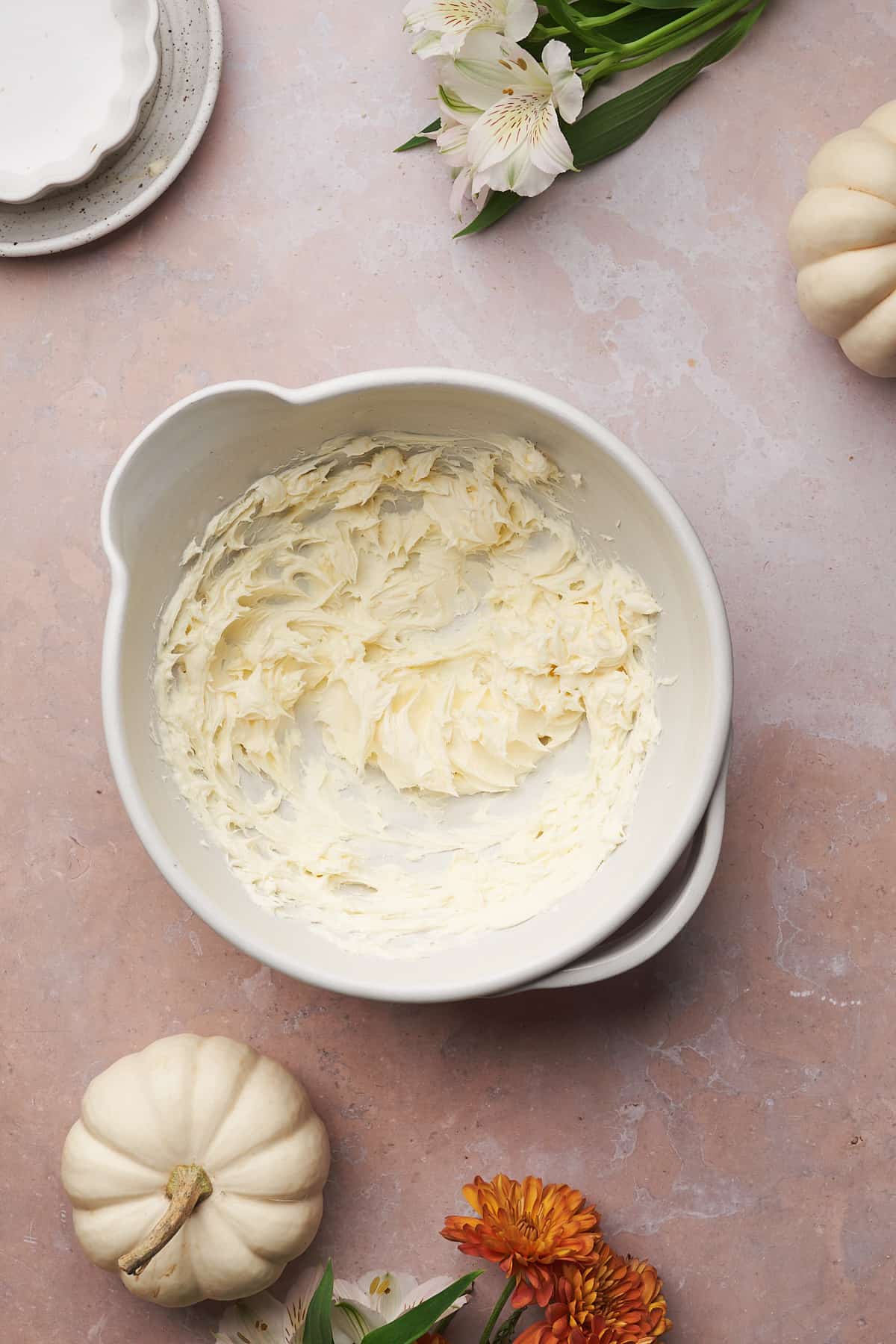 softened cream cheese and butter in a medium mixing bowl. 