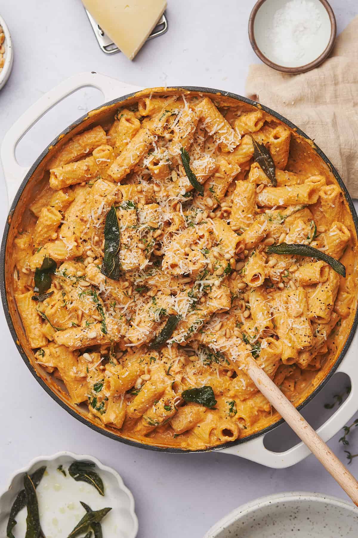 pumpkin pasta sauce served with rigatoni, fried sage, parmesan, and toasted pine nuts.