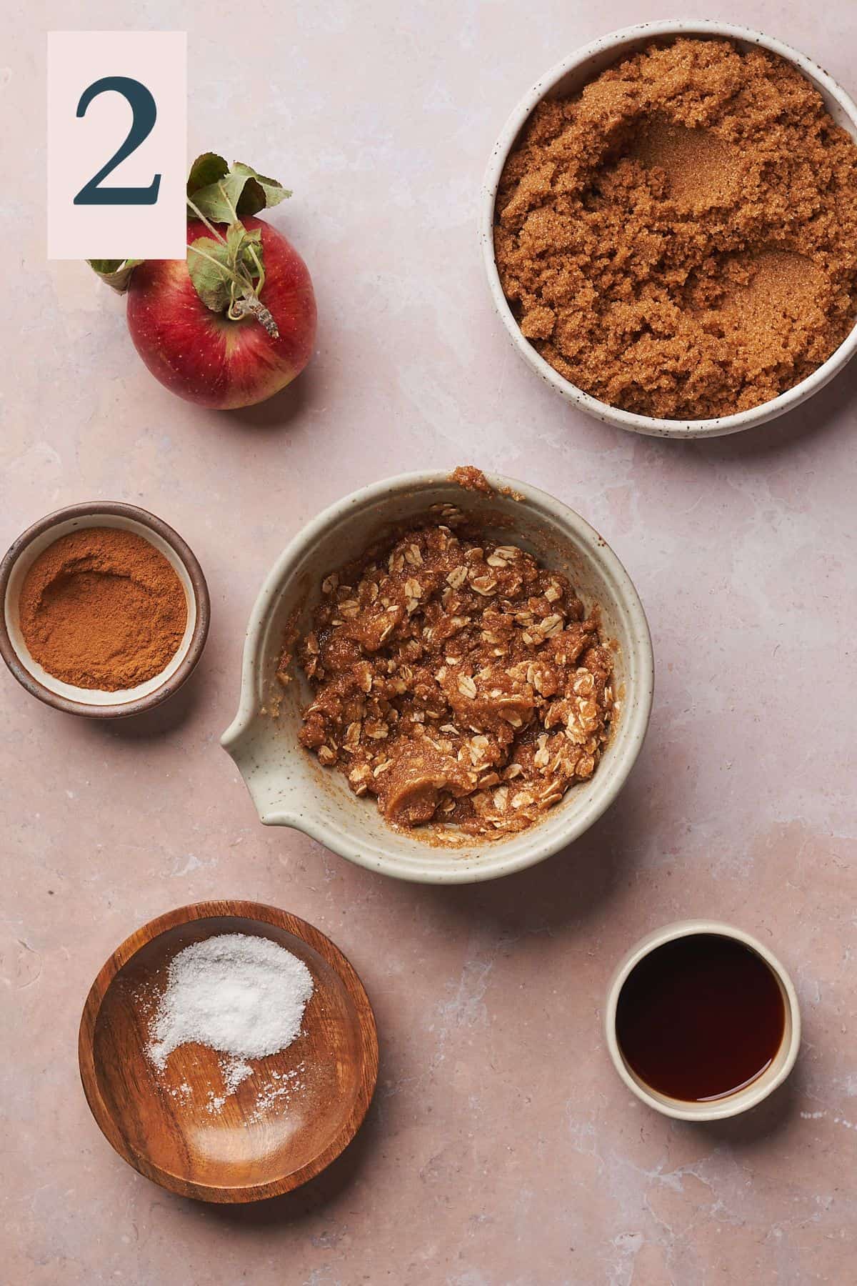 all ingredients combined in a small bowl to make a streusel topping for apple muffins. 