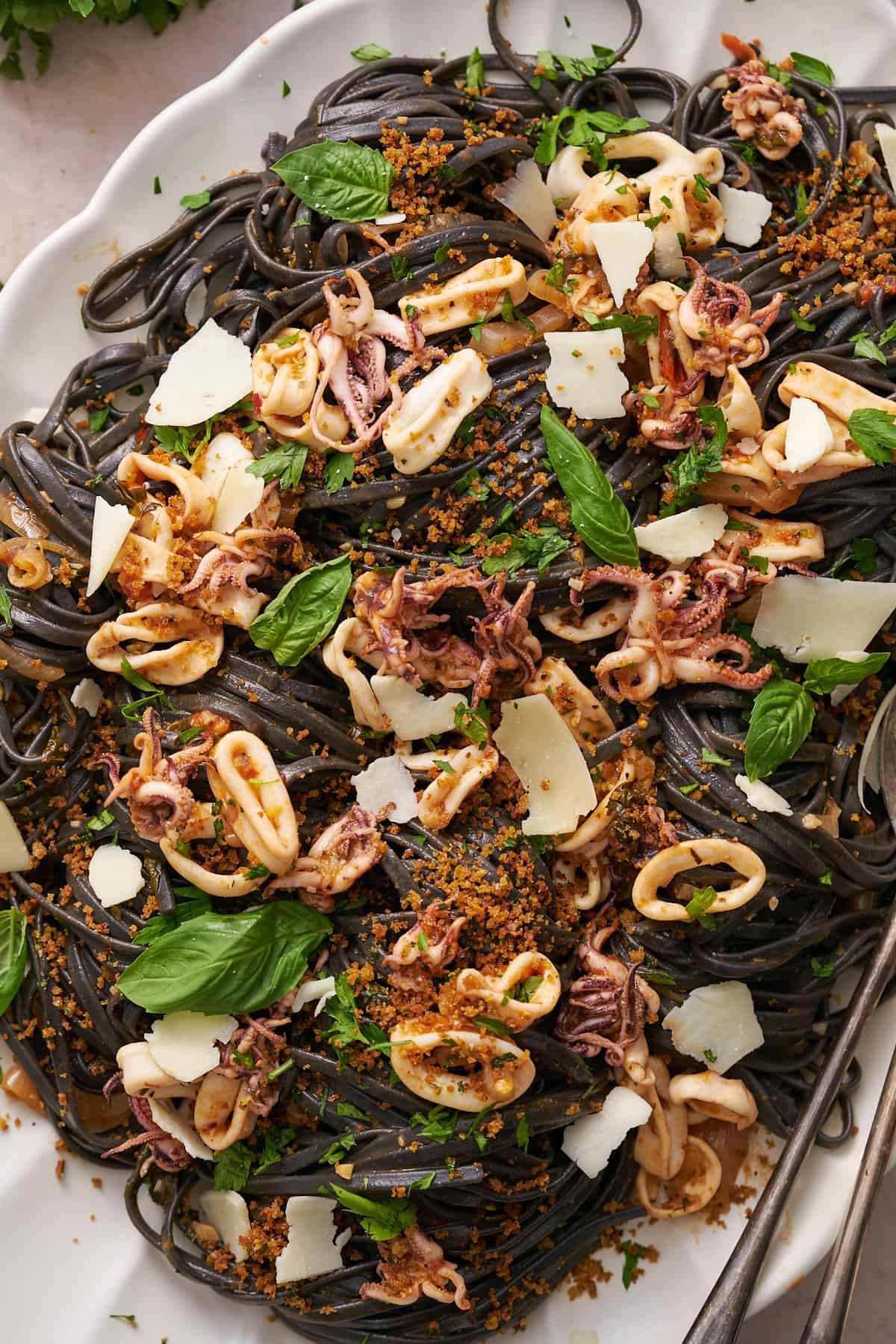 black squid ink pasta with squid tentacles, parmesan, basil, parsley, and crispy breadcrumbs.  