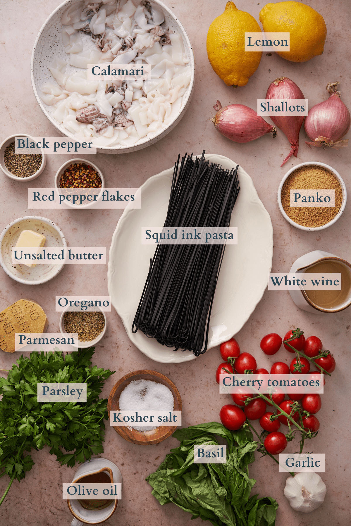 squid ink pasta ingredients separated on plates with text overlaying to denote each ingredient.