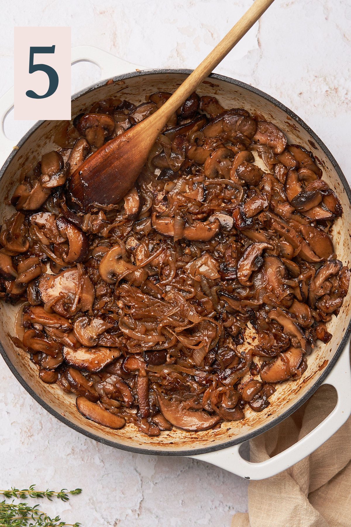 caramelized onions and mushrooms in an enameled cast iron skillet.