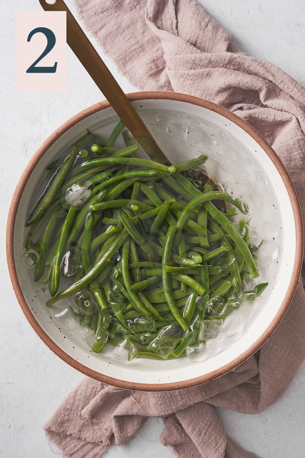 green beans in a bath of ice water. 
