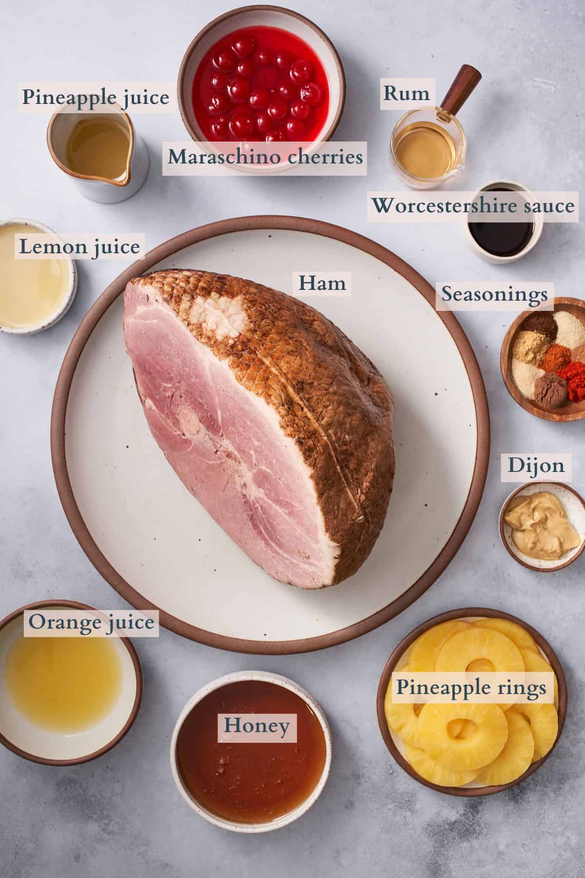 ingredients to make a pineapple honey glazed ham with text overlaying to denote each ingredient.