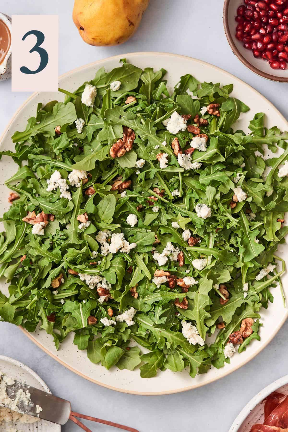 arugula with walnuts, and blue cheese crumbles.