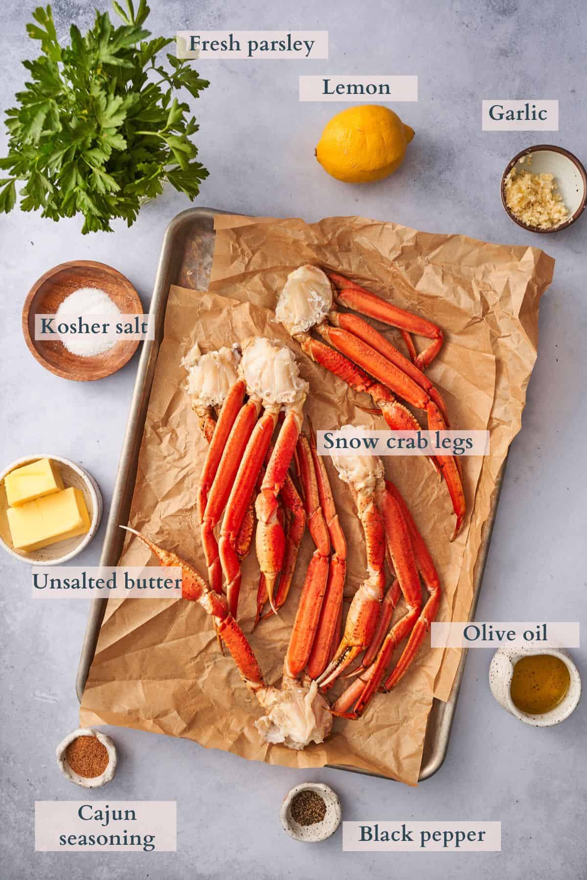 Baked crab legs ingredients with text overlaying to denote each ingredient. 