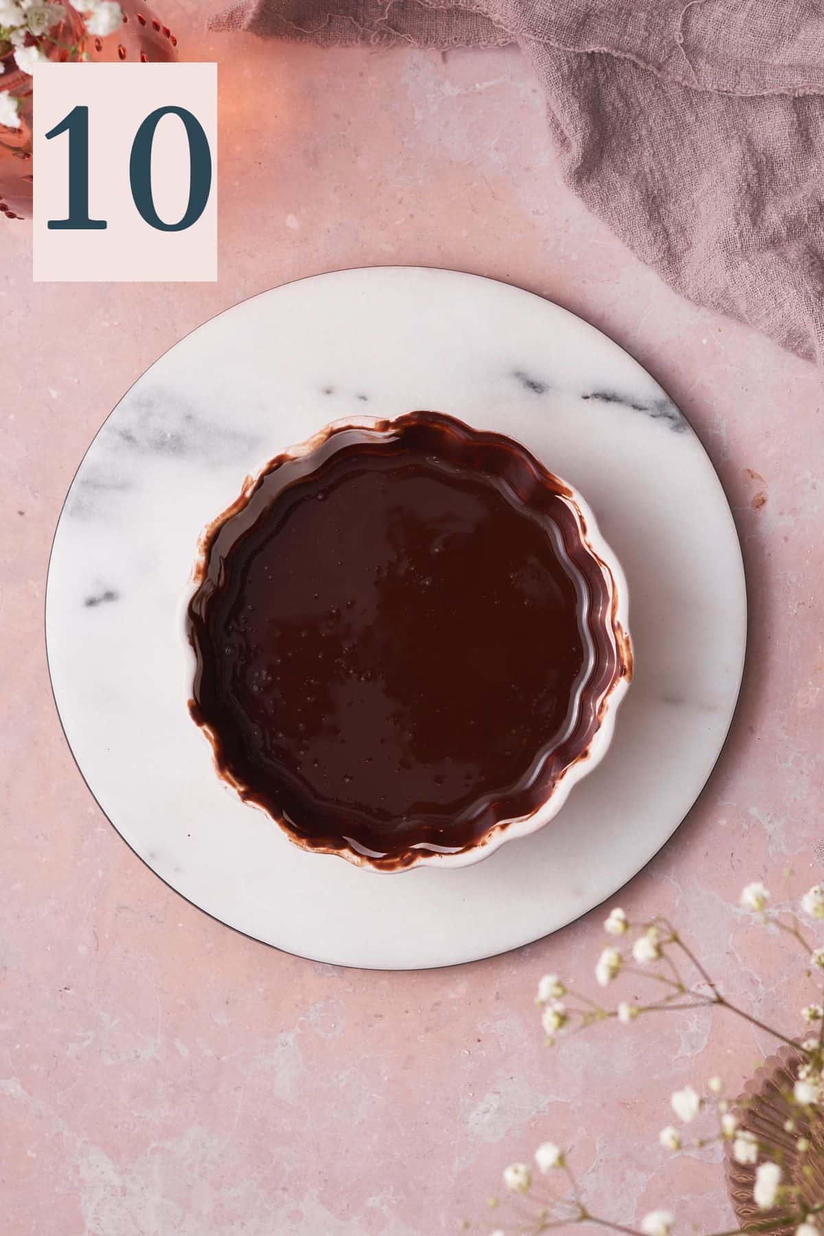 melted chocolate in a small bowl with ruffled edges. 