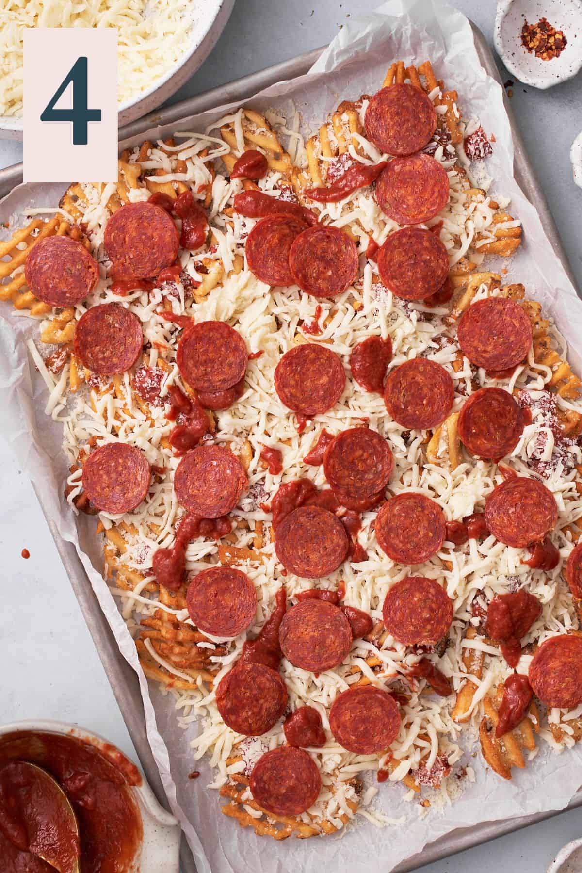 Topping pizza fries with pepperoni.